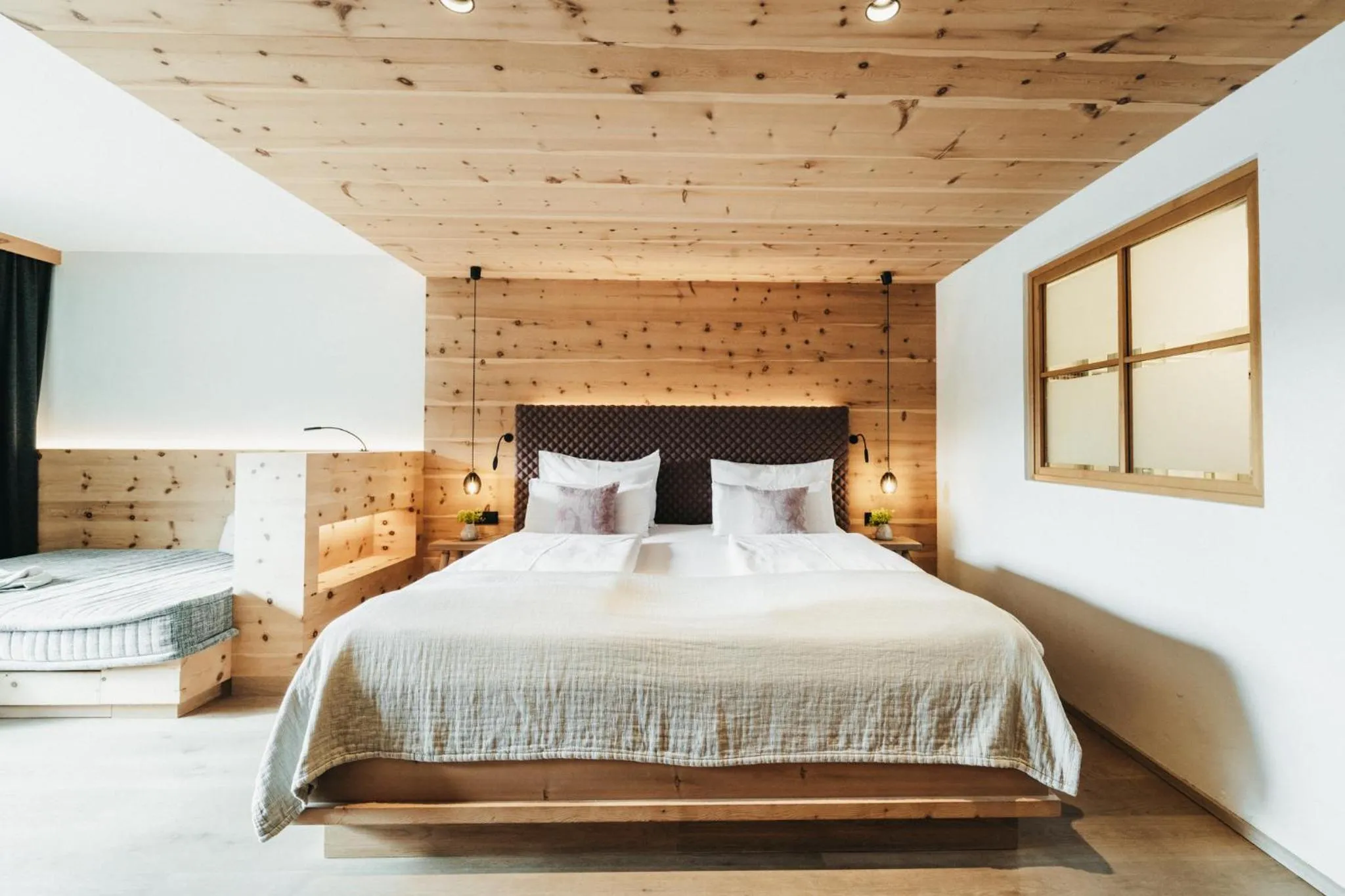 Bed in Biohotel Rupertus