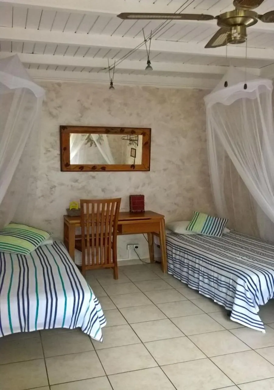 Bedroom, Bed in Caraib'Bay Hotel