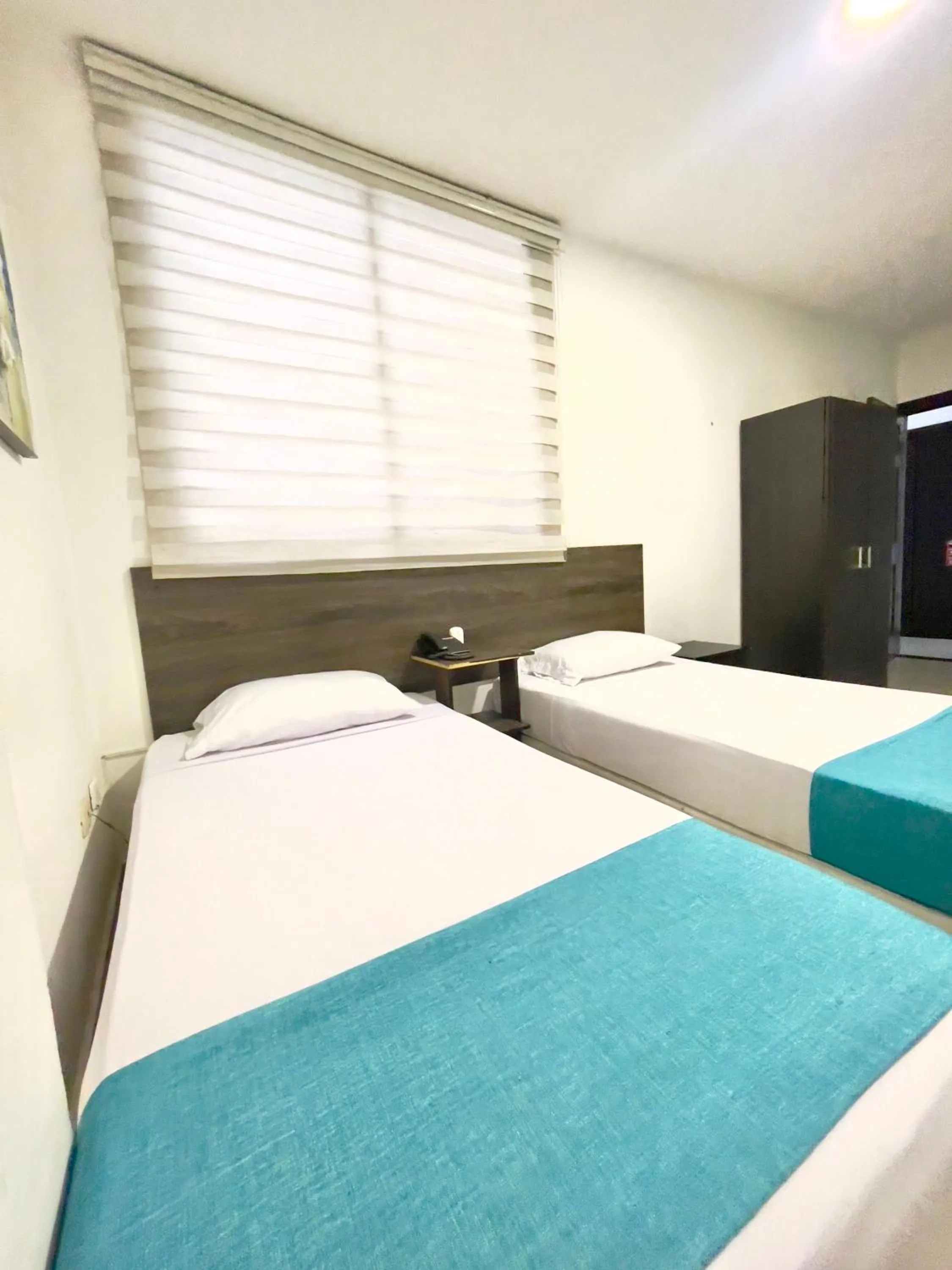 Photo of the whole room, Bed in Hotel Suite Center Pereira