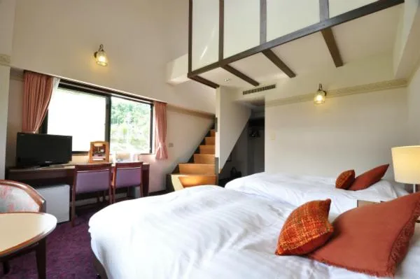 Bed in Hakuba Yamano Hotel