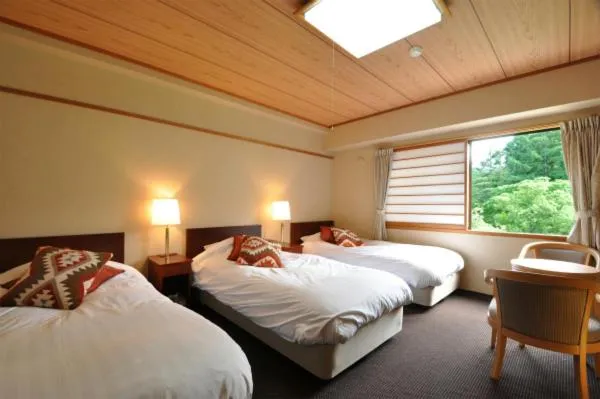 Bed in Hakuba Yamano Hotel