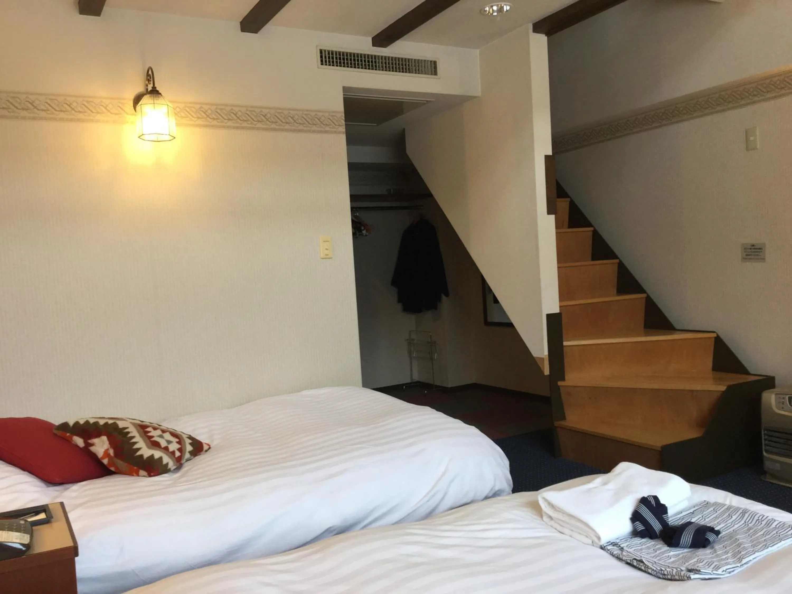 Bed in Hakuba Yamano Hotel