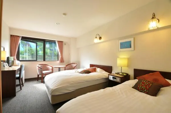 Bed in Hakuba Yamano Hotel