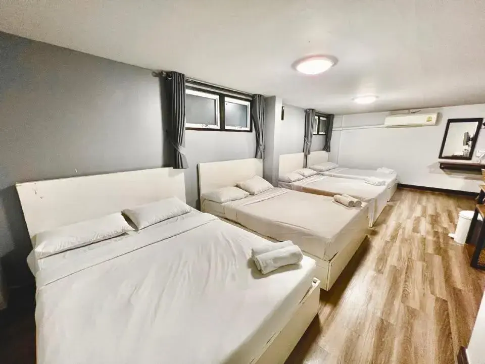 Bed in Pimpimarn Hotel Bed in Pimpimarn Hotel