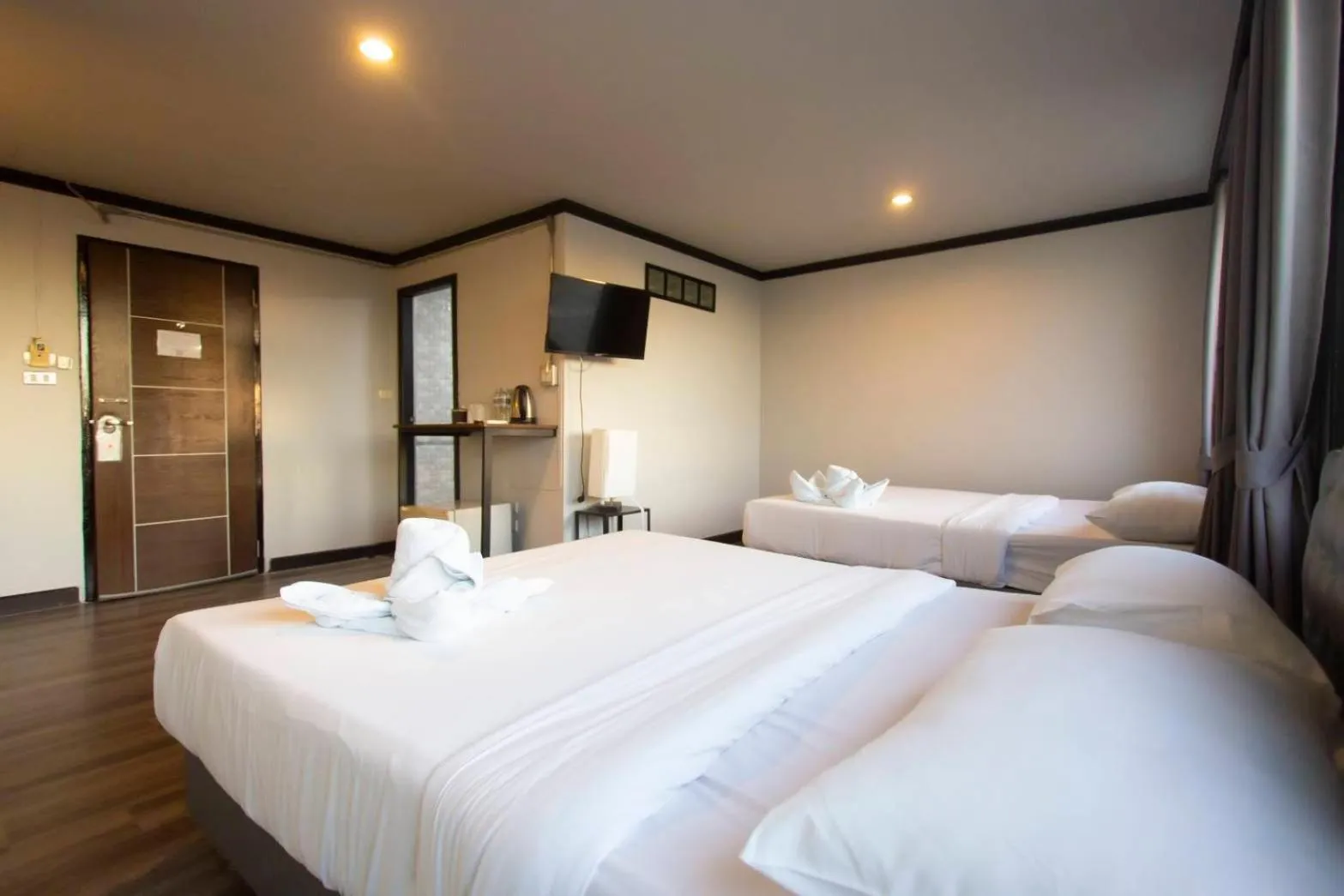 Bed in Pimpimarn Hotel