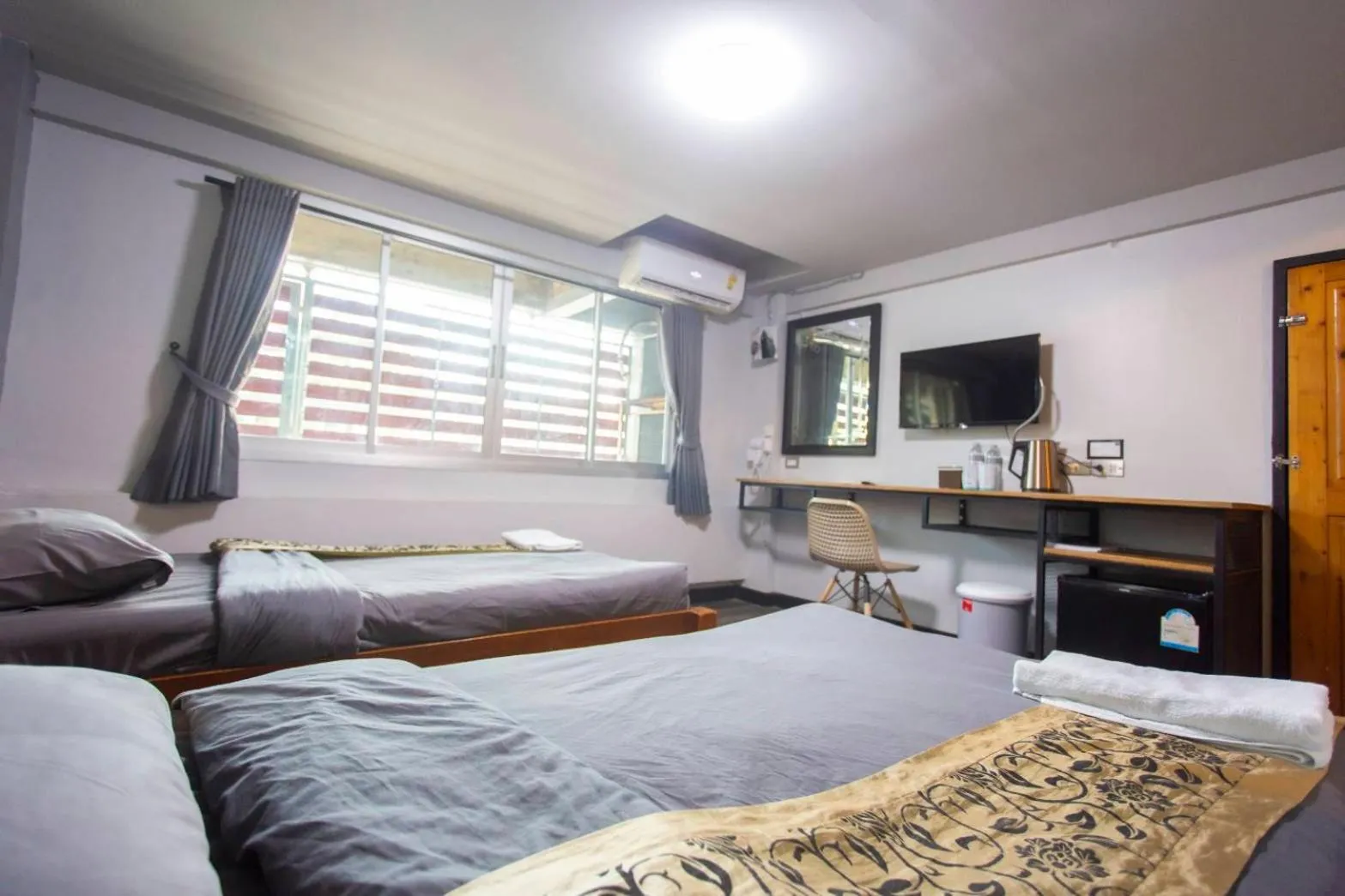 Bed in Pimpimarn Hotel