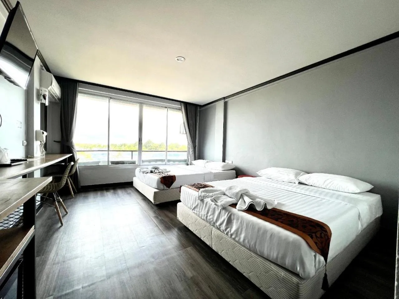 Bed in Pimpimarn Hotel