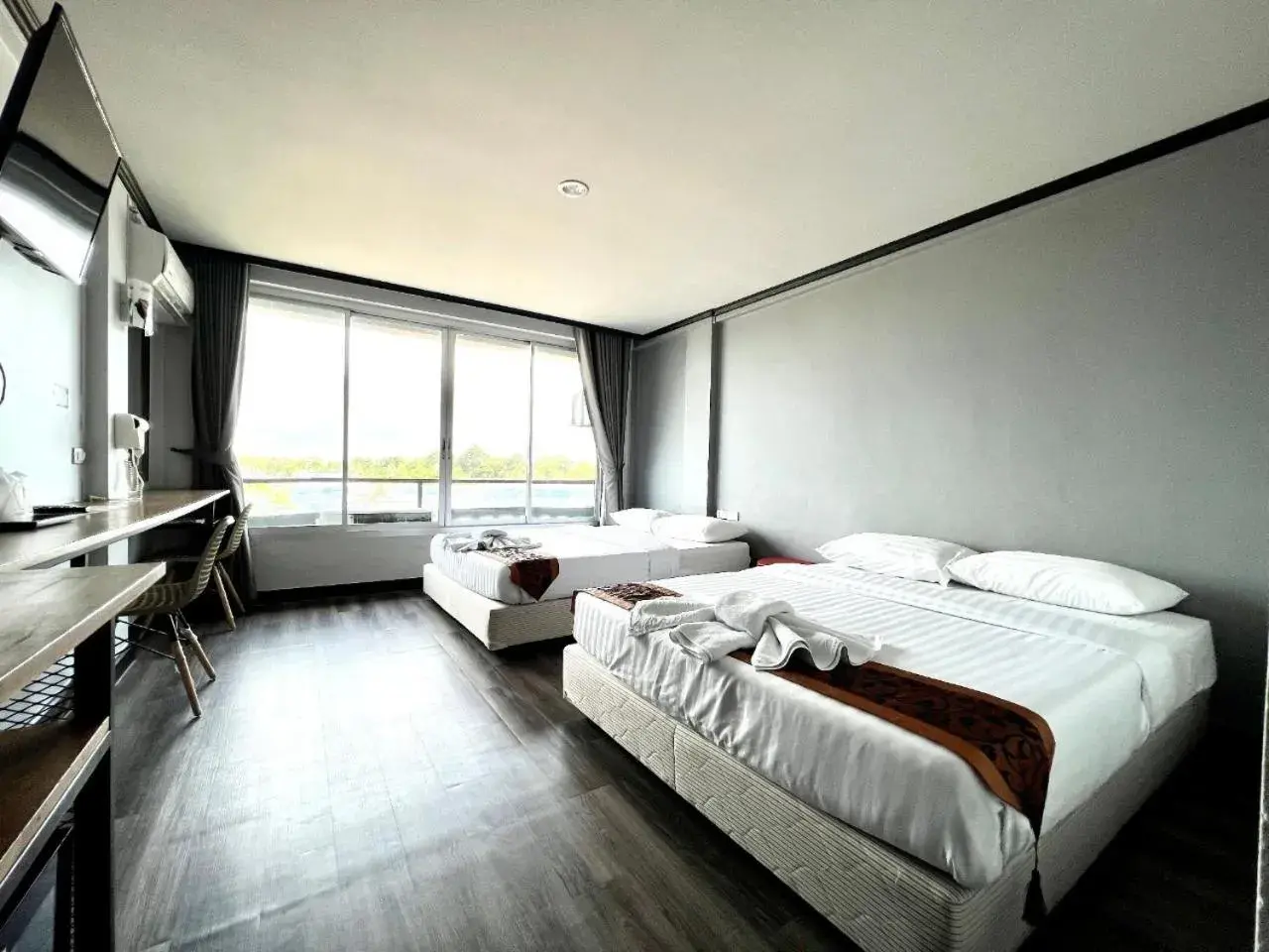 Bed in Pimpimarn Hotel Bed in Pimpimarn Hotel