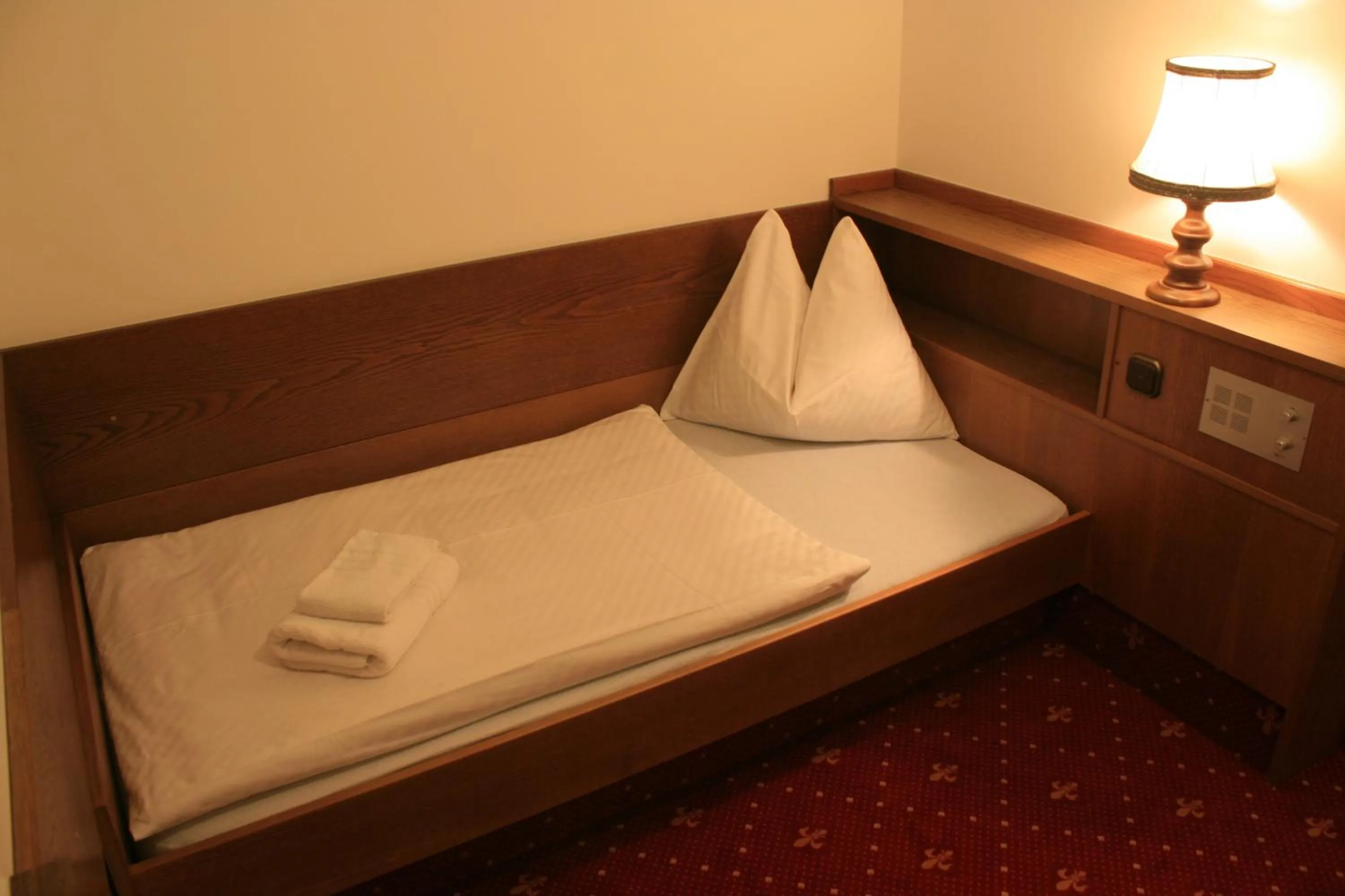 Bed in Hotel Lindwurm