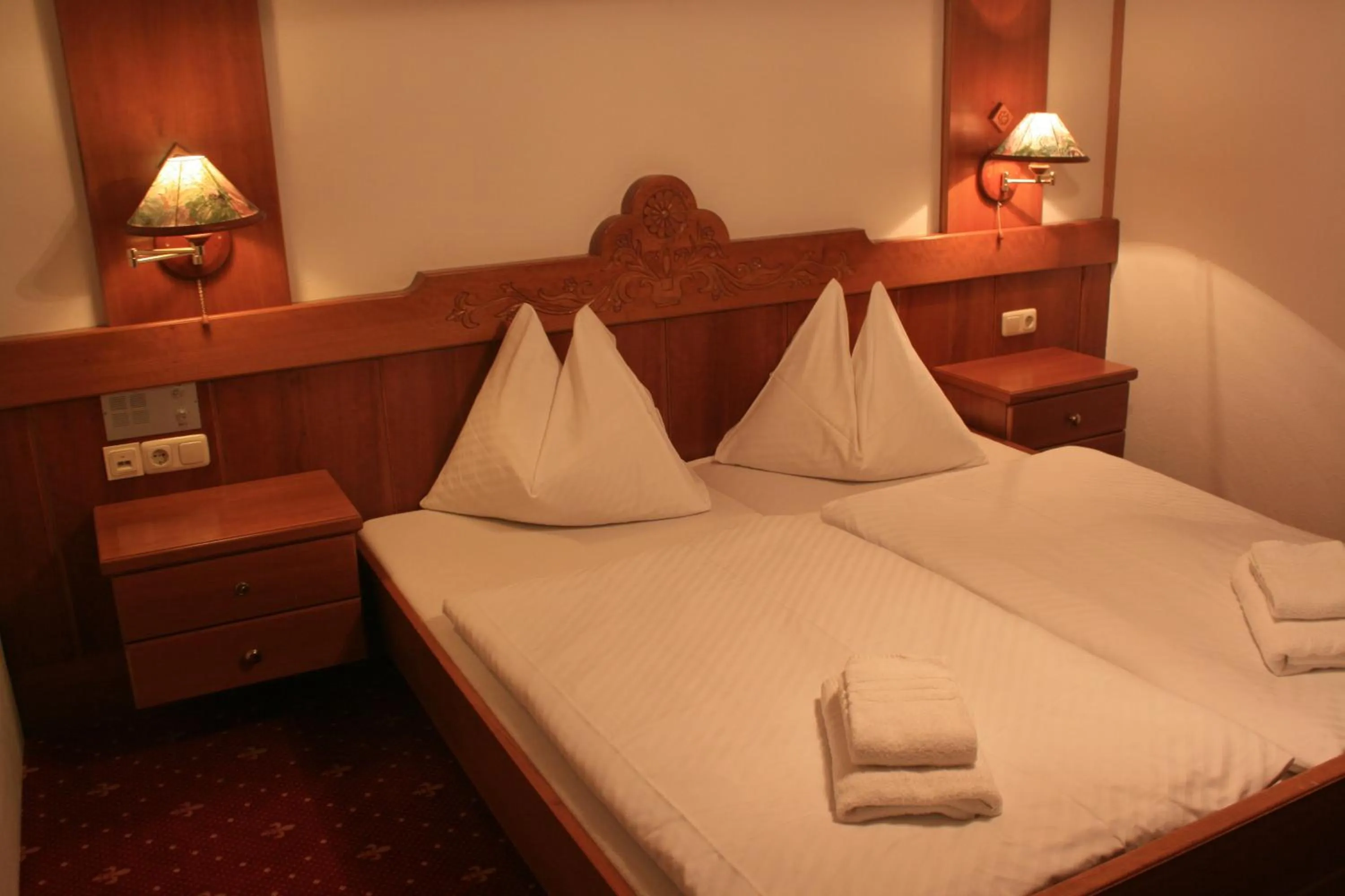 Bed in Hotel Lindwurm