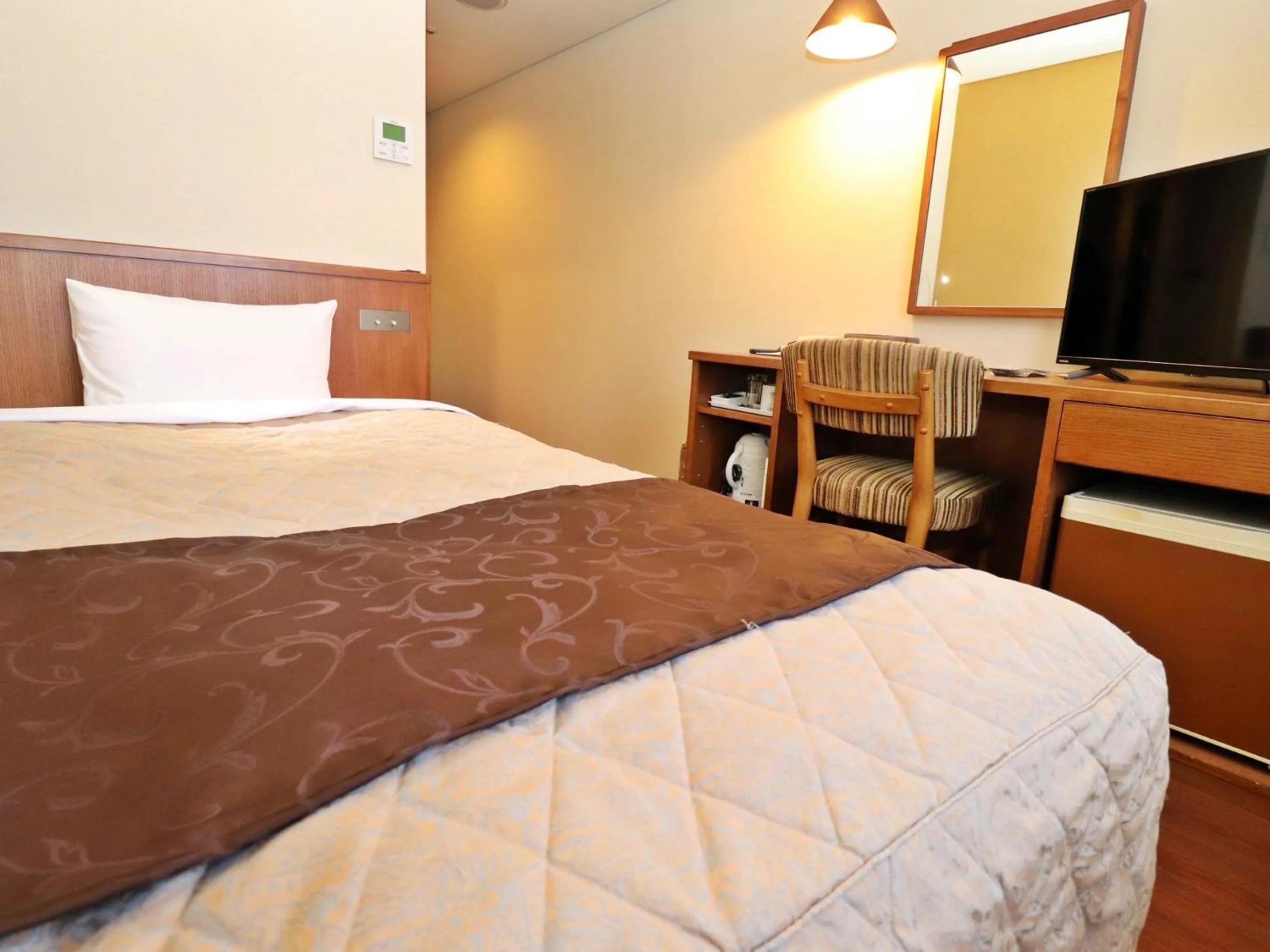 Bed in Tottori Onsen Hotel Monarque Tottori