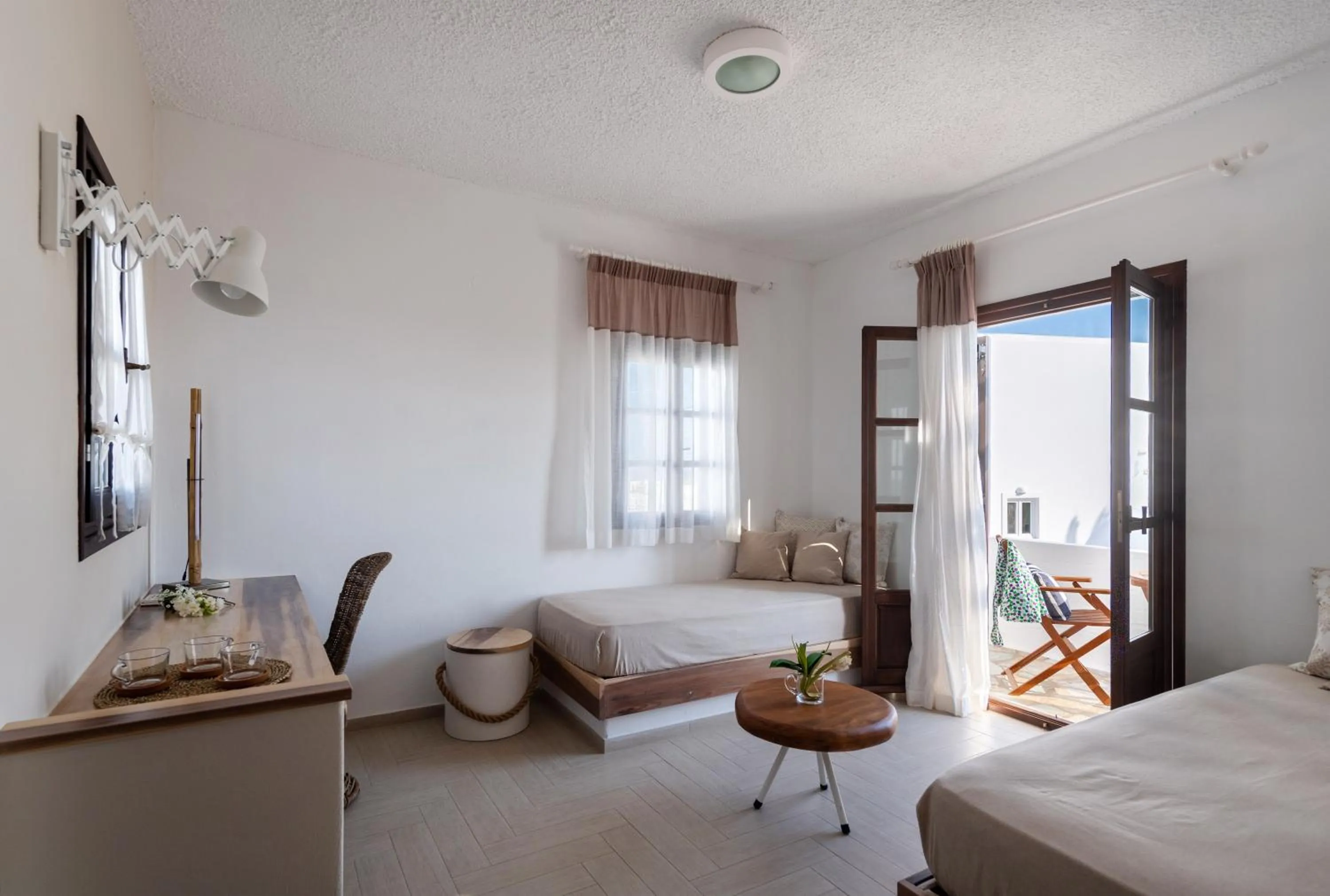 Seating area, Bed in Aella Residence