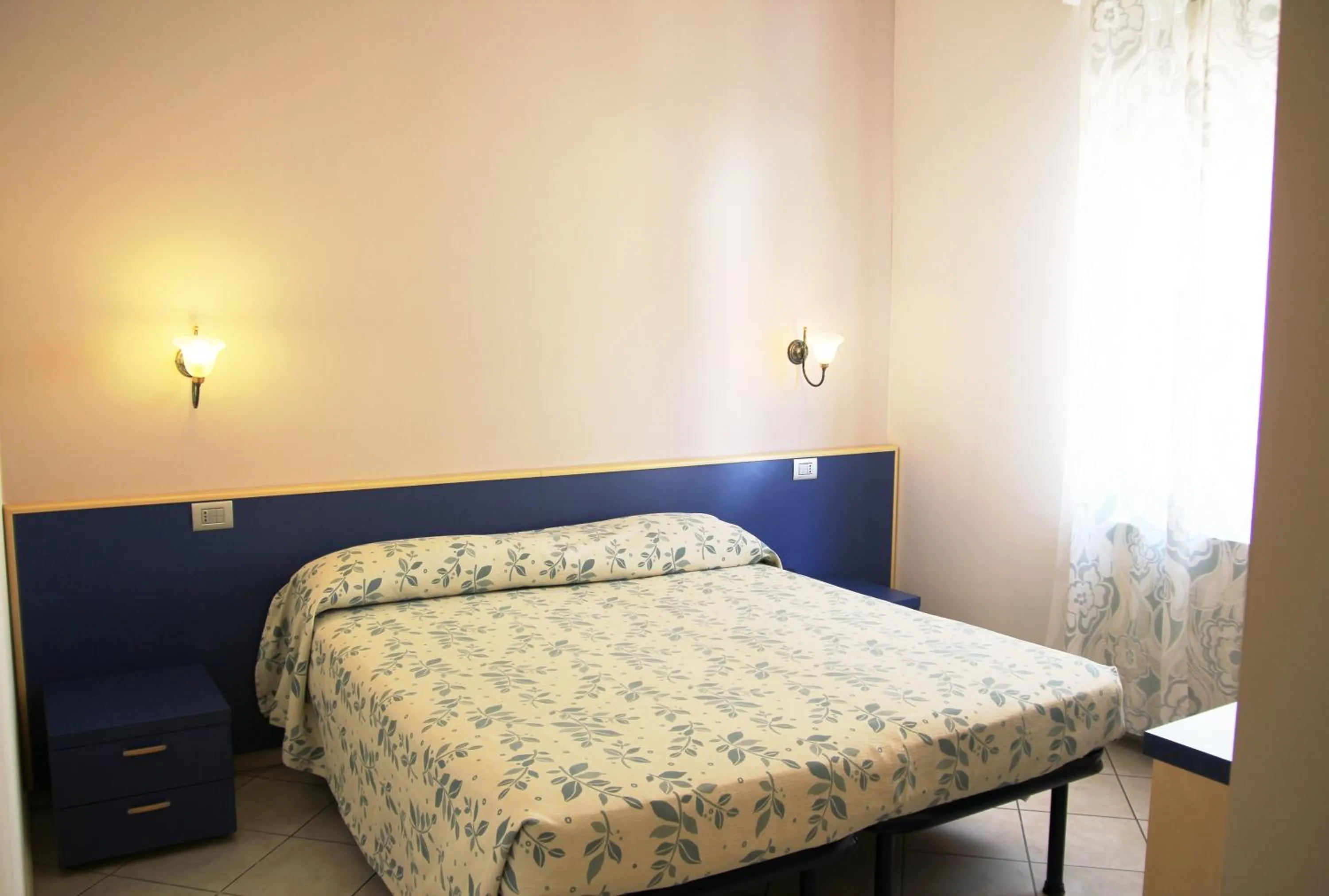 Photo of the whole room, Bed in Albergo La Mimosa