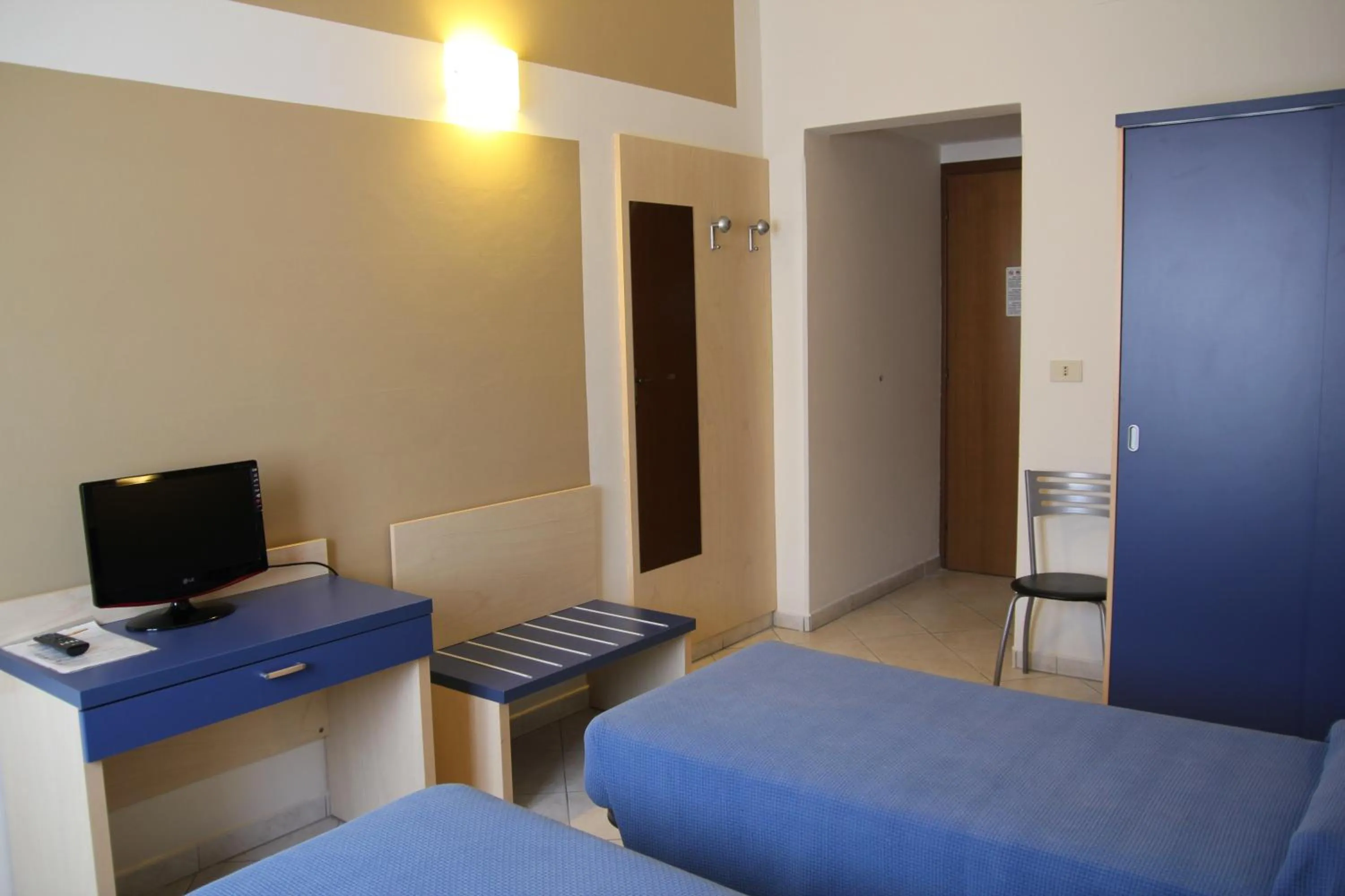 Photo of the whole room, Bed in Albergo La Mimosa