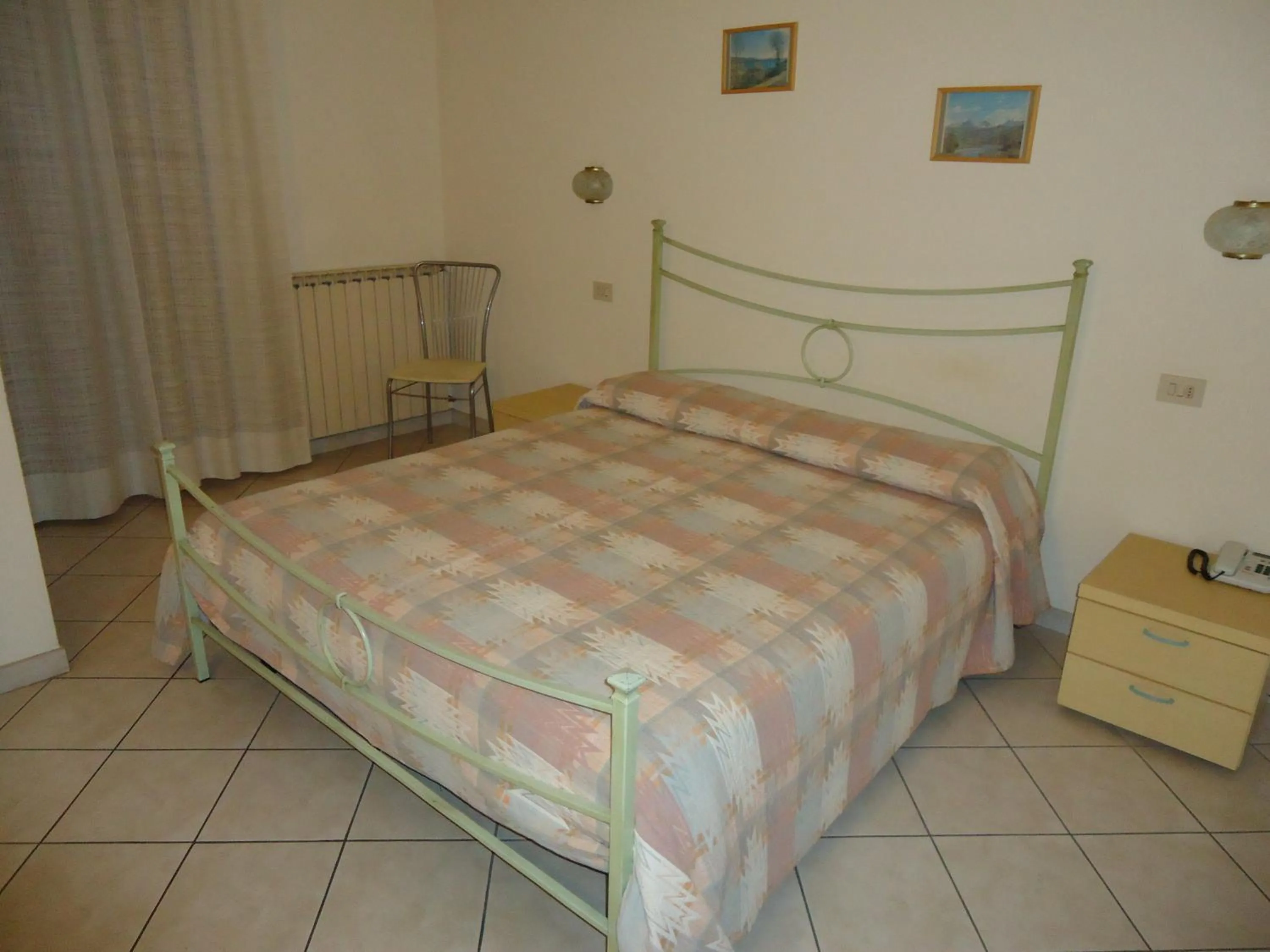 Photo of the whole room, Bed in Albergo La Mimosa