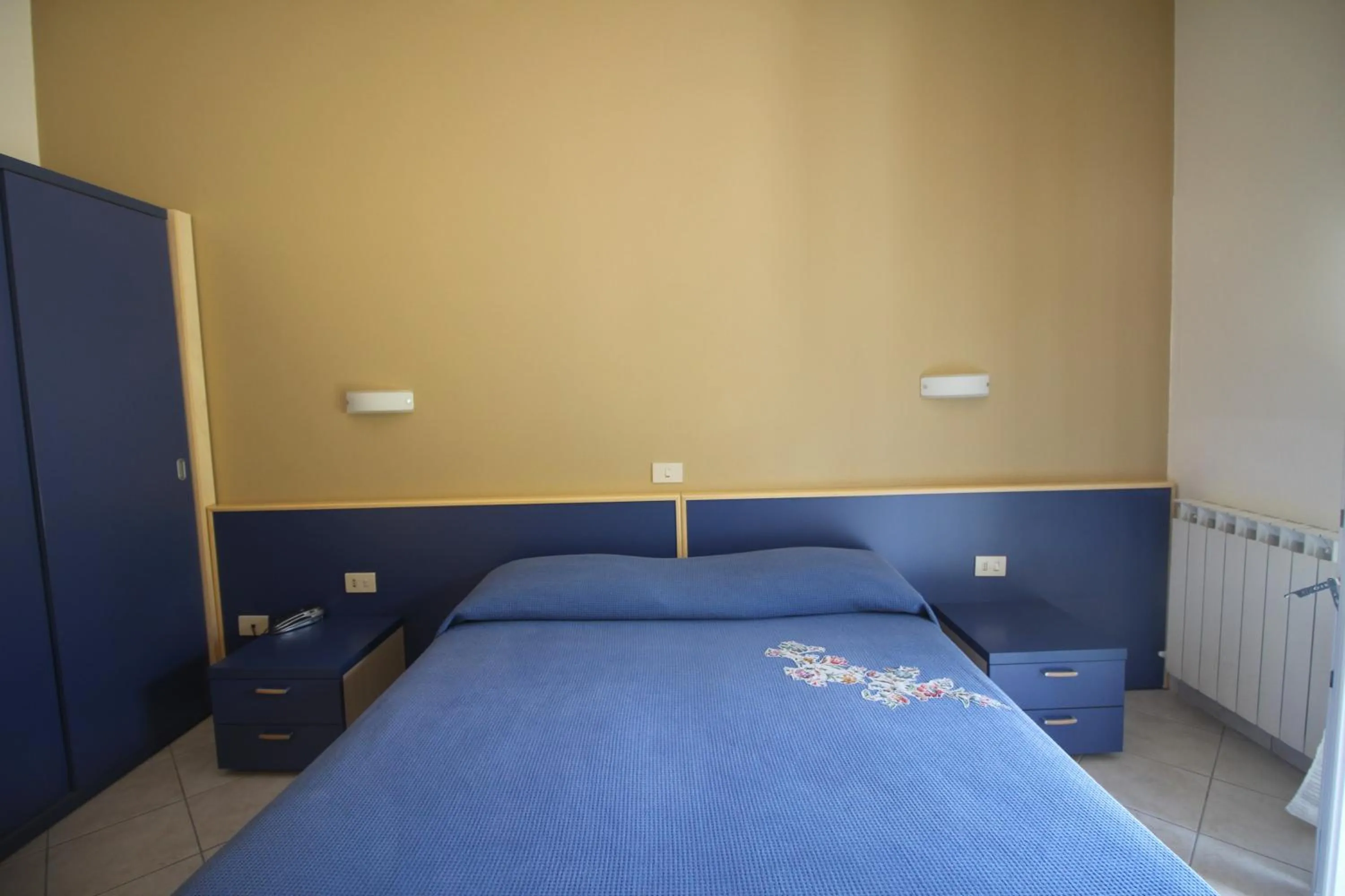 Photo of the whole room, Bed in Albergo La Mimosa