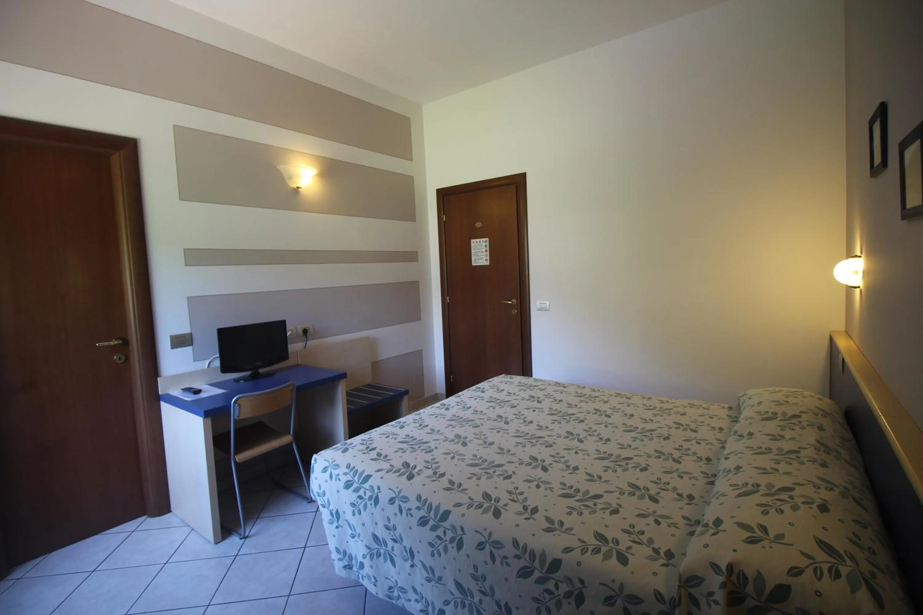 Photo of the whole room, Bed in Albergo La Mimosa