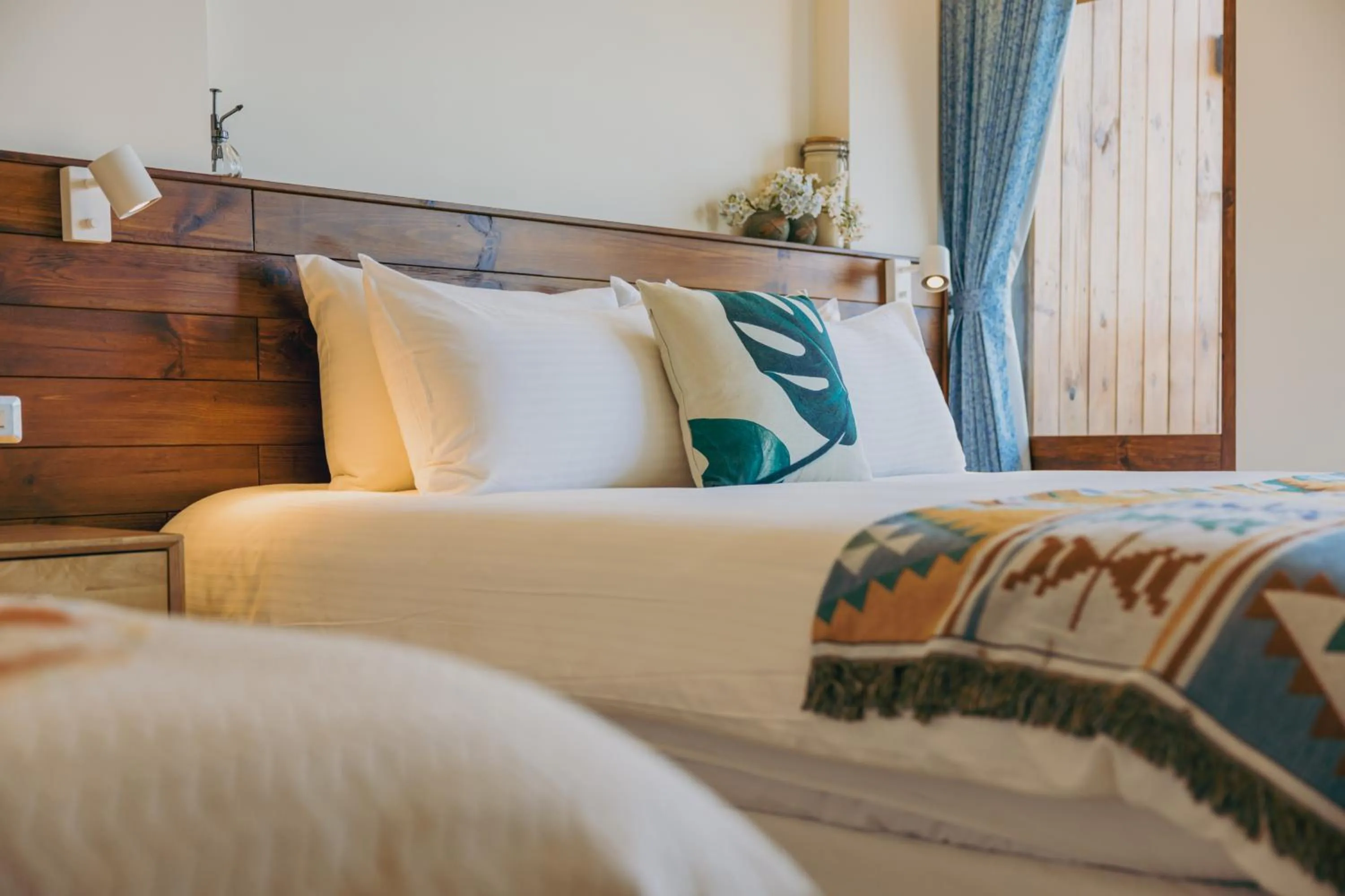 Bed in Chuanfanrock Haku Beach Days Inn