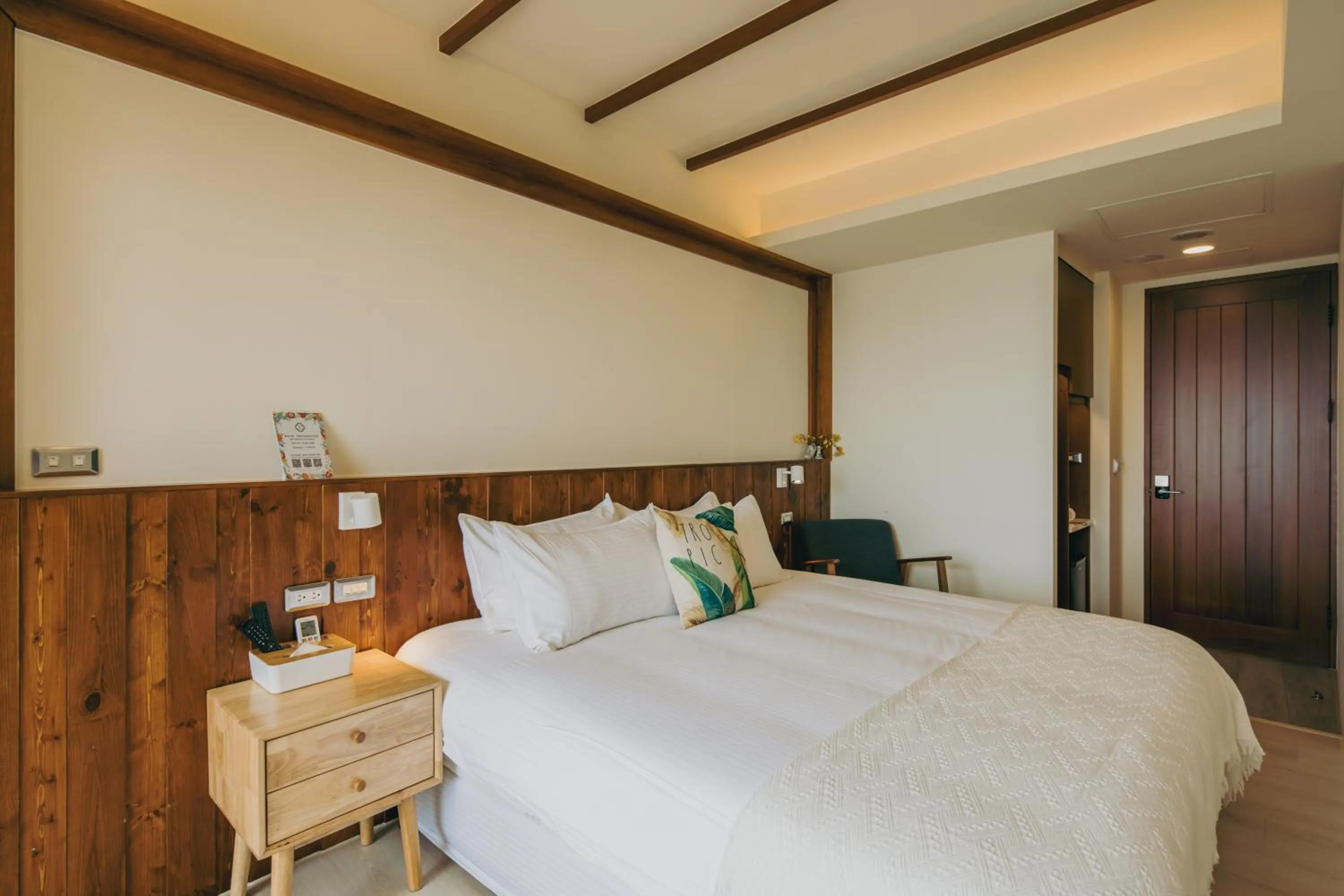 Bed in Chuanfanrock Haku Beach Days Inn