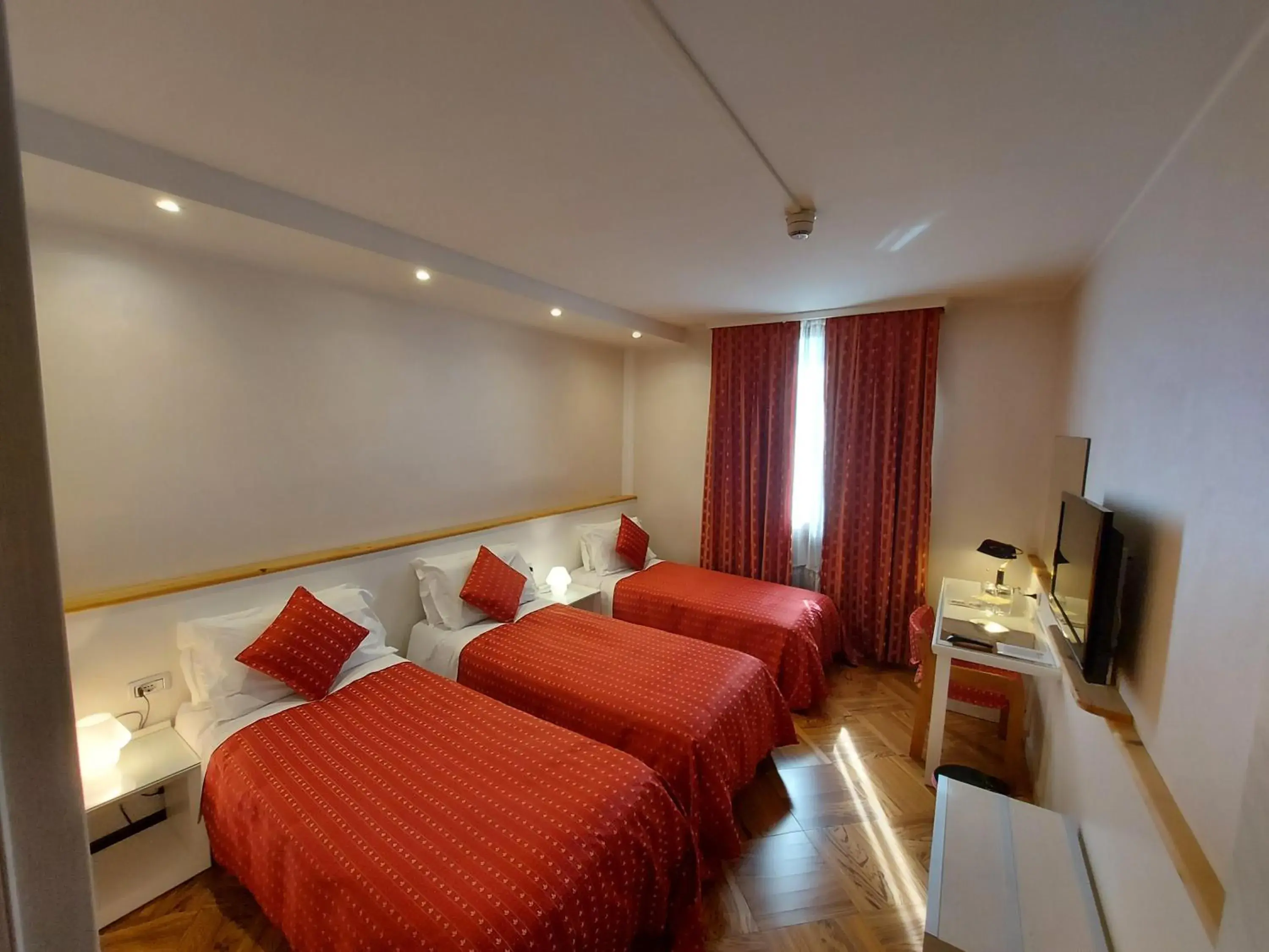 Triple Room in Hotel Posta 77 Triple Room in Hotel Posta 77