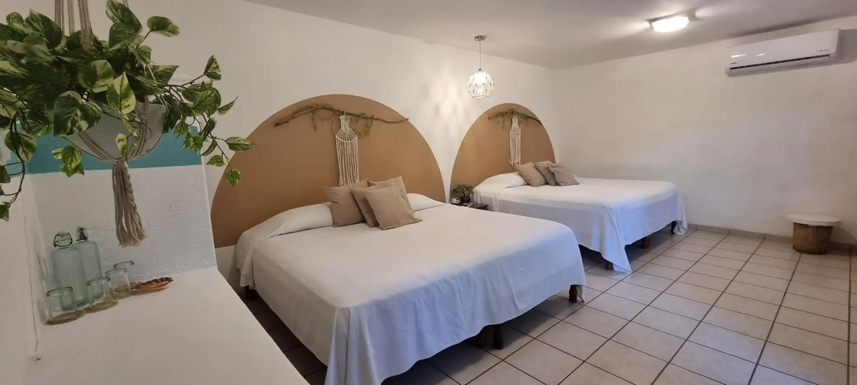 Quadruple Room with Garden View in Hotel Taboga Eco Boutique & Spa Costa Esmeralda Quadruple Room with Garden View in Hotel Taboga Eco Boutique & Spa Costa Esmeralda