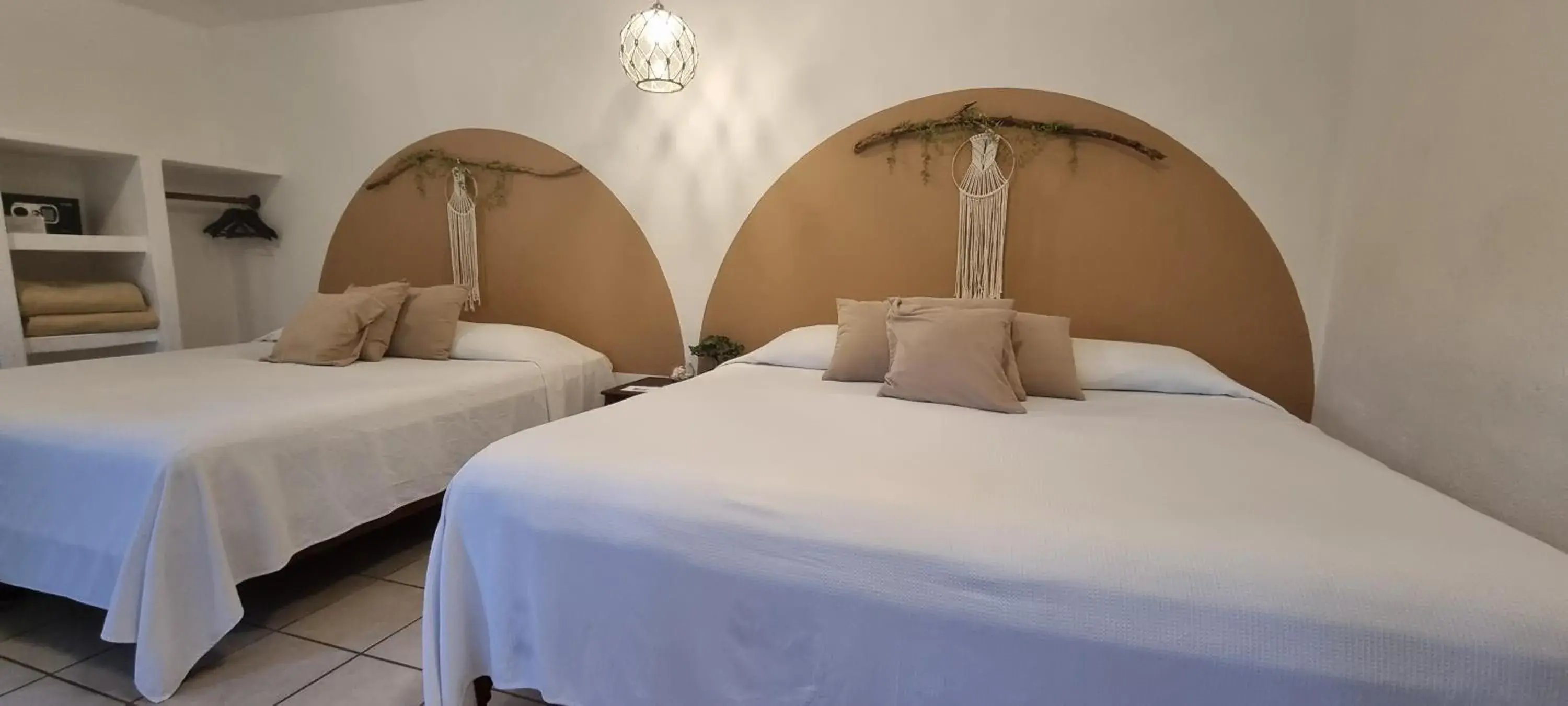 Quadruple Room with Garden View in Hotel Taboga Eco Boutique & Spa Costa Esmeralda Quadruple Room with Garden View in Hotel Taboga Eco Boutique & Spa Costa Esmeralda