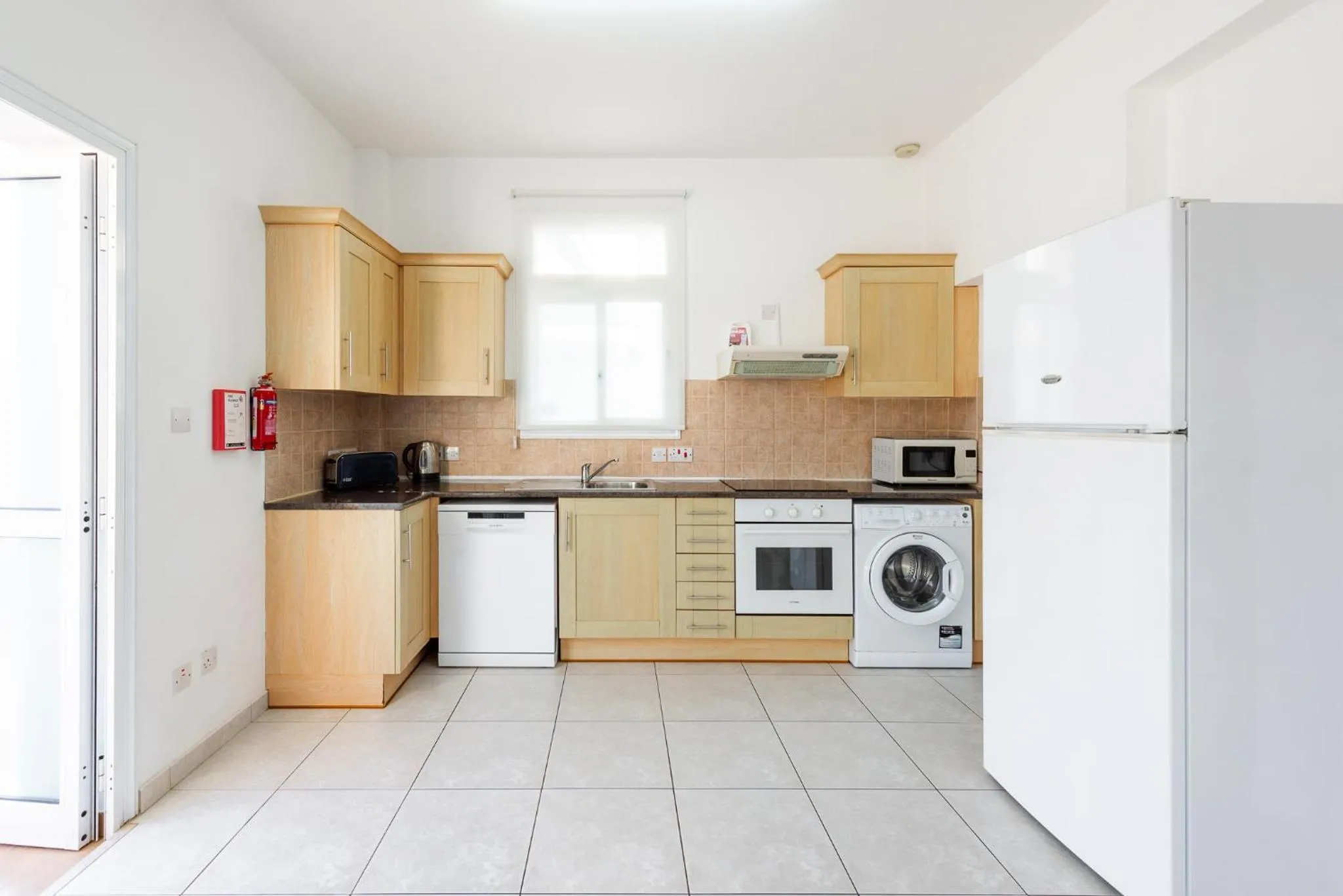 kitchen in Villa Palm Breeze by Ezoria Villas