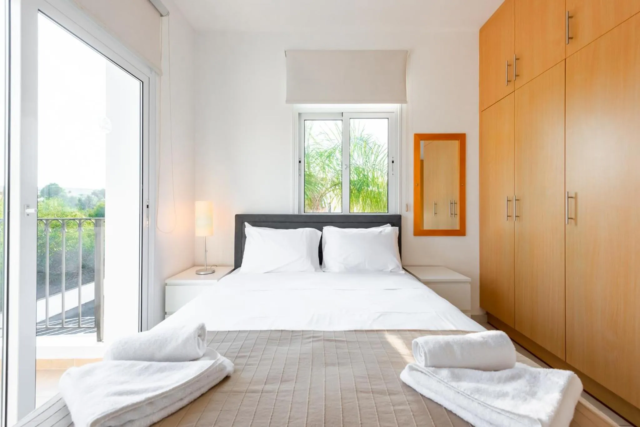 Bed in Villa Palm Breeze by Ezoria Villas