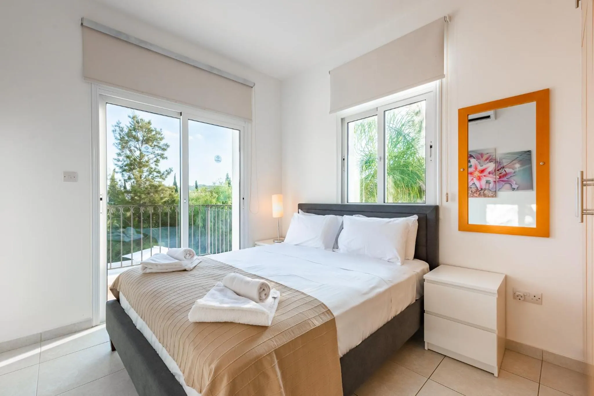 Bed in Villa Palm Breeze by Ezoria Villas