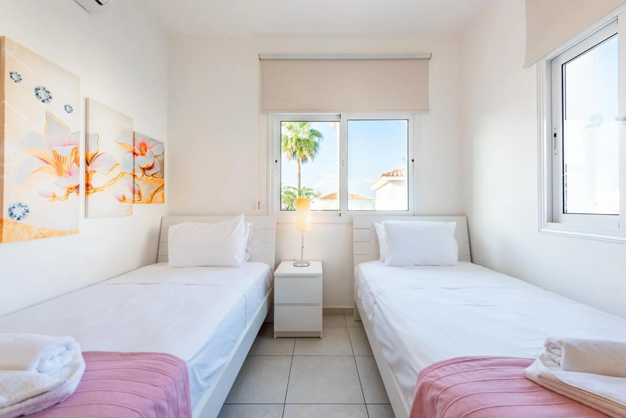 Bed in Villa Palm Breeze by Ezoria Villas