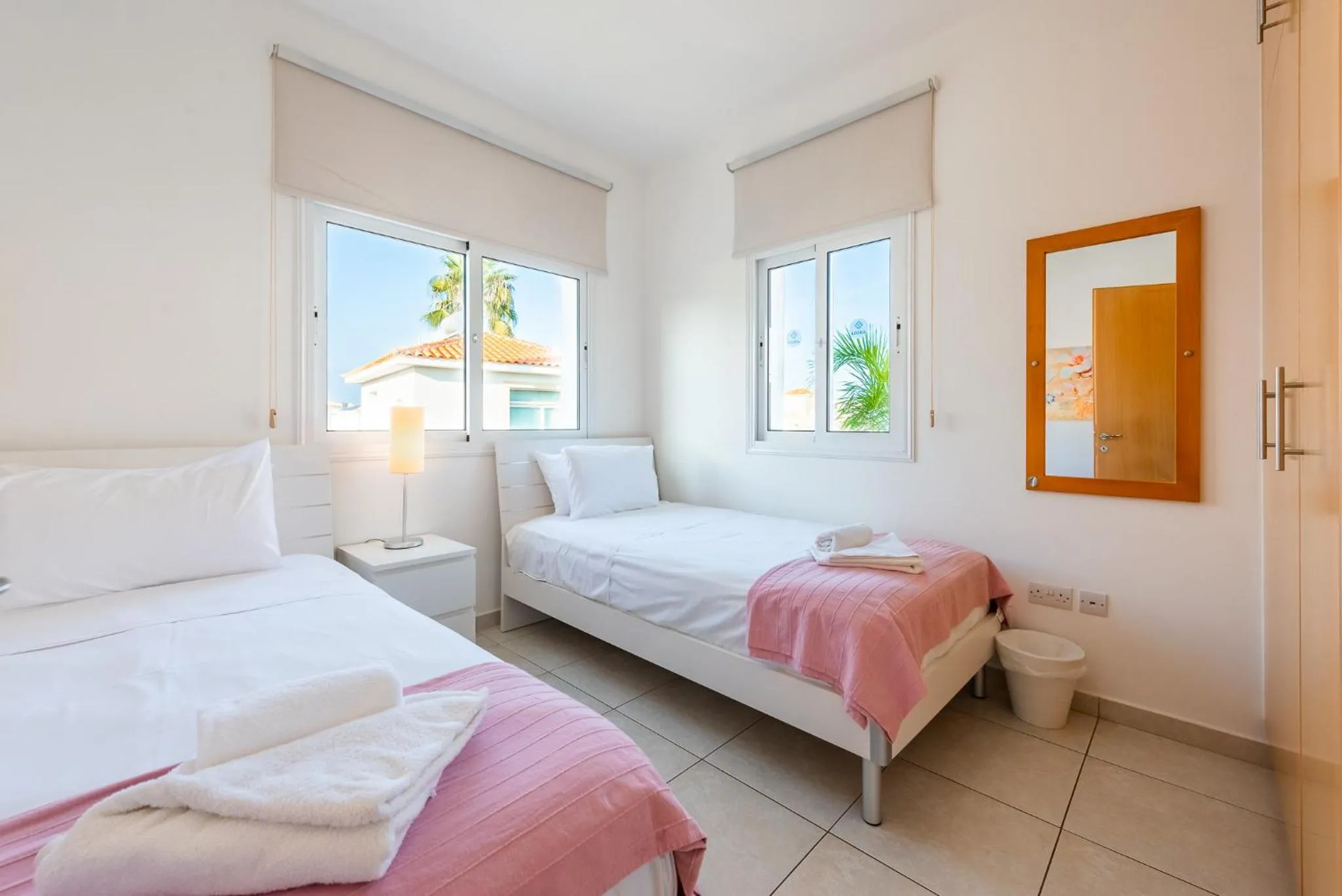 Bed in Villa Palm Breeze by Ezoria Villas