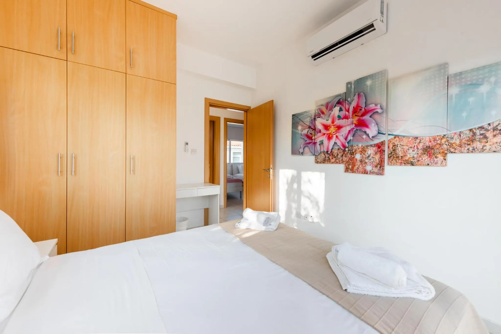 Bed in Villa Palm Breeze by Ezoria Villas