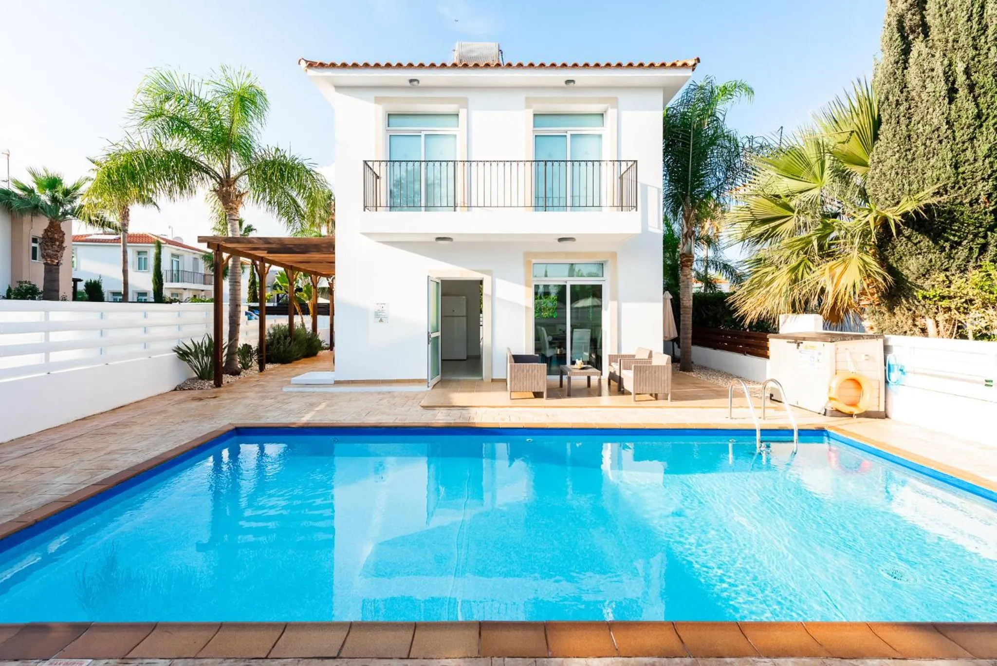 Swimming pool in Villa Palm Breeze by Ezoria Villas