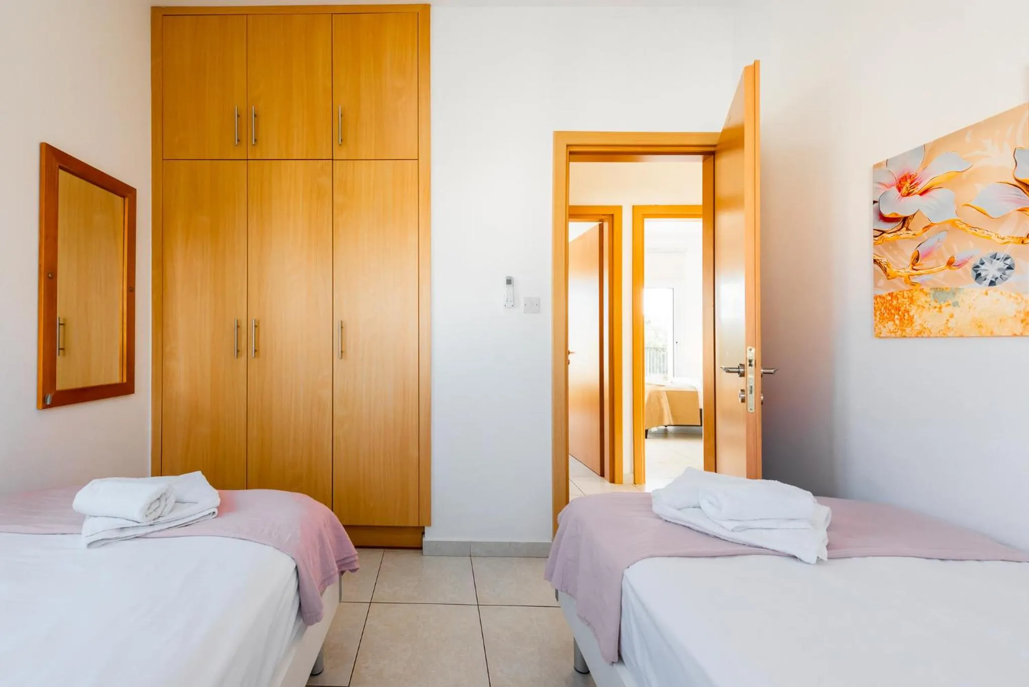 Bed in Villa Palm Breeze by Ezoria Villas