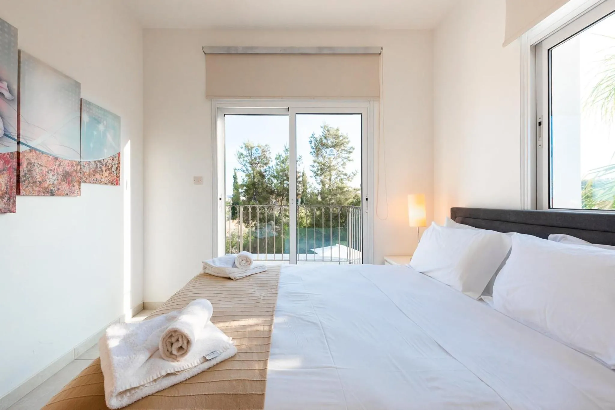 Bed in Villa Palm Breeze by Ezoria Villas
