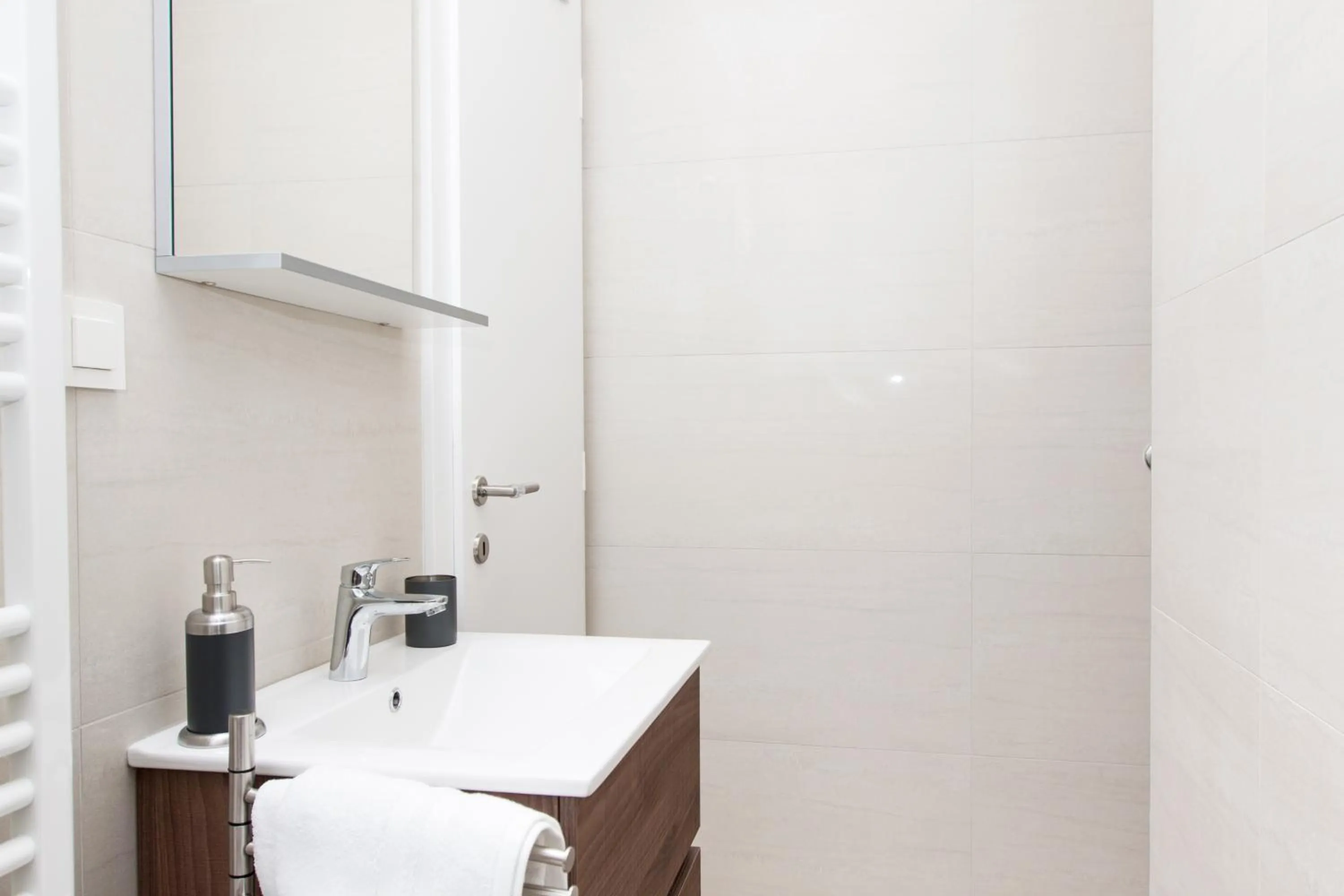 Bathroom in Luxury Main Square Apartments