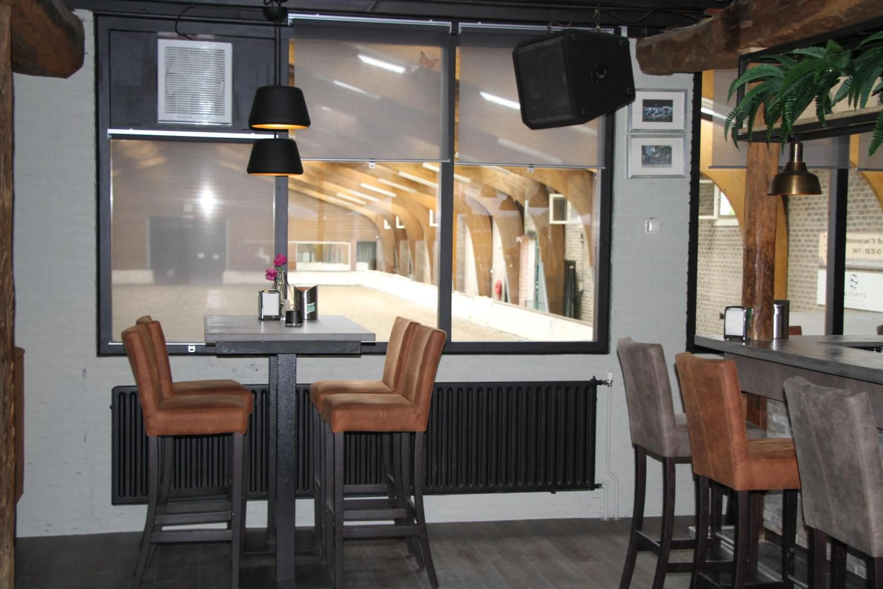 Lounge or bar in B&B de Rekkendonken