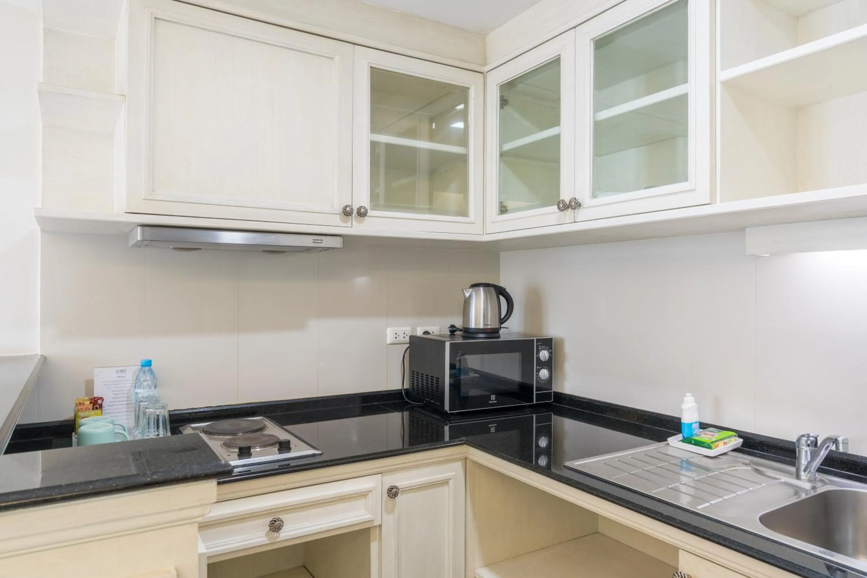 Kitchen or kitchenette in Sabai Sathorn Service Apartment