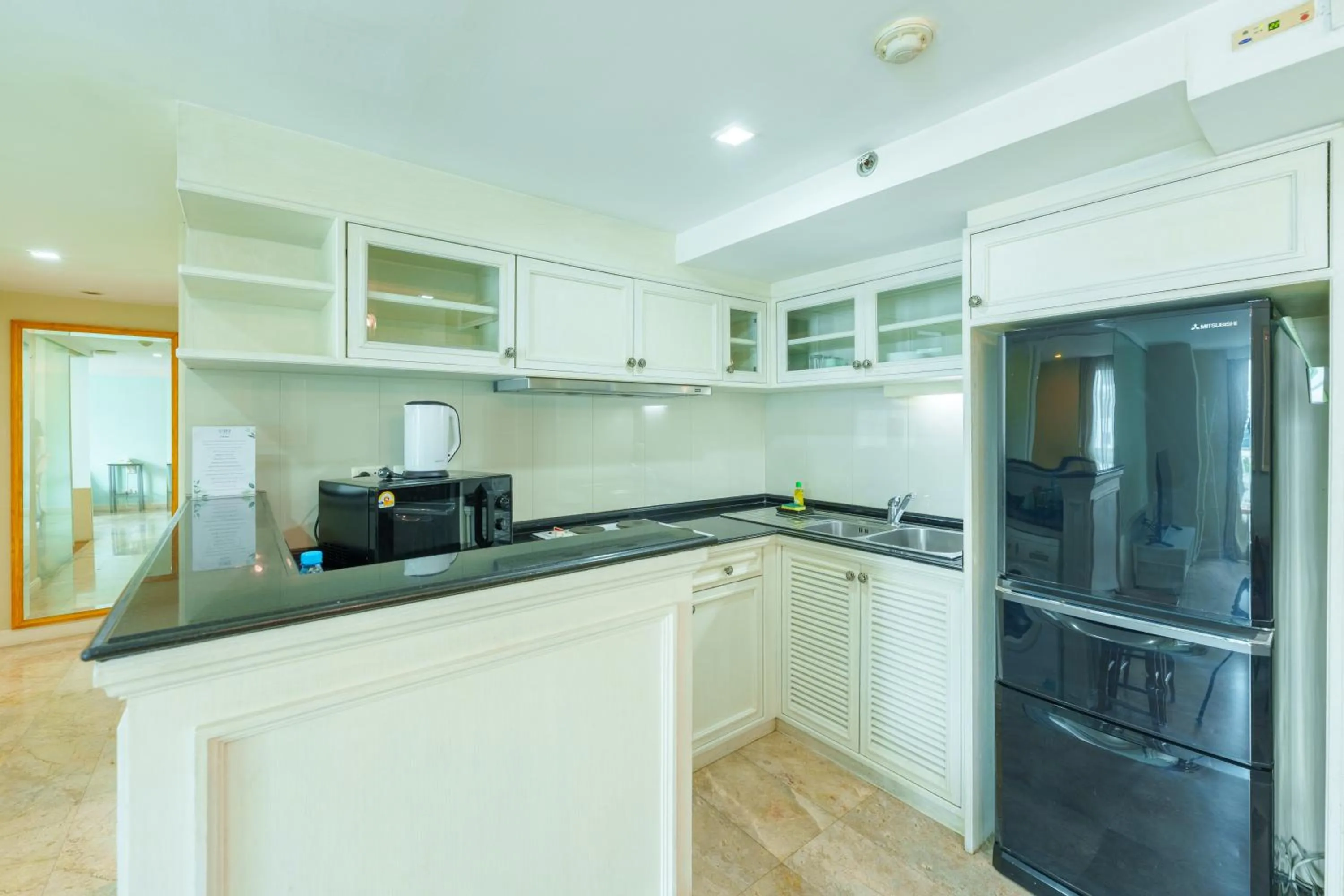 Kitchen or kitchenette in Sabai Sathorn Service Apartment