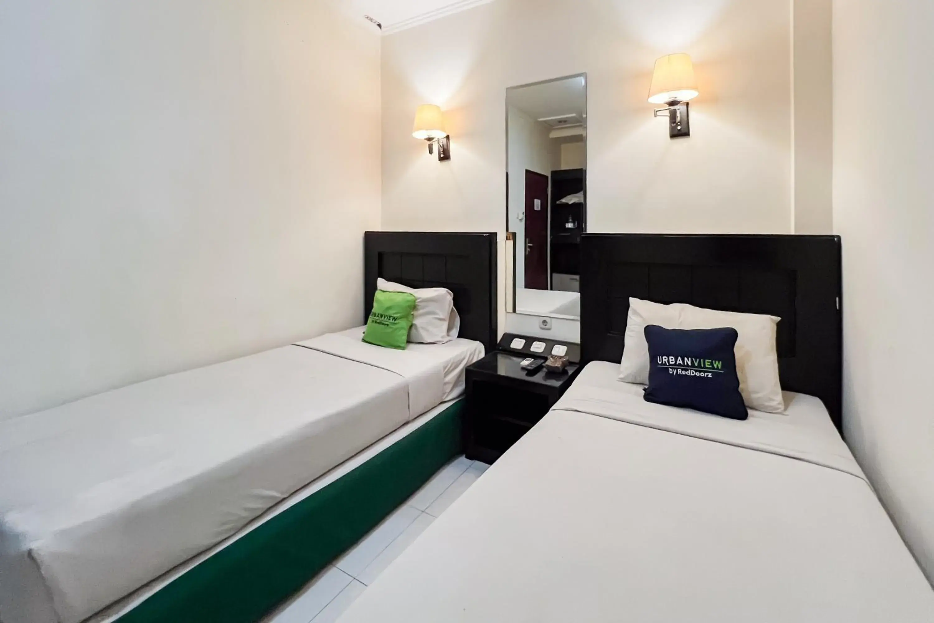 Bedroom, Bed in Urbanview Hotel Yasmin Makassar by RedDoorz Bedroom, Bed in Urbanview Hotel Yasmin Makassar by RedDoorz