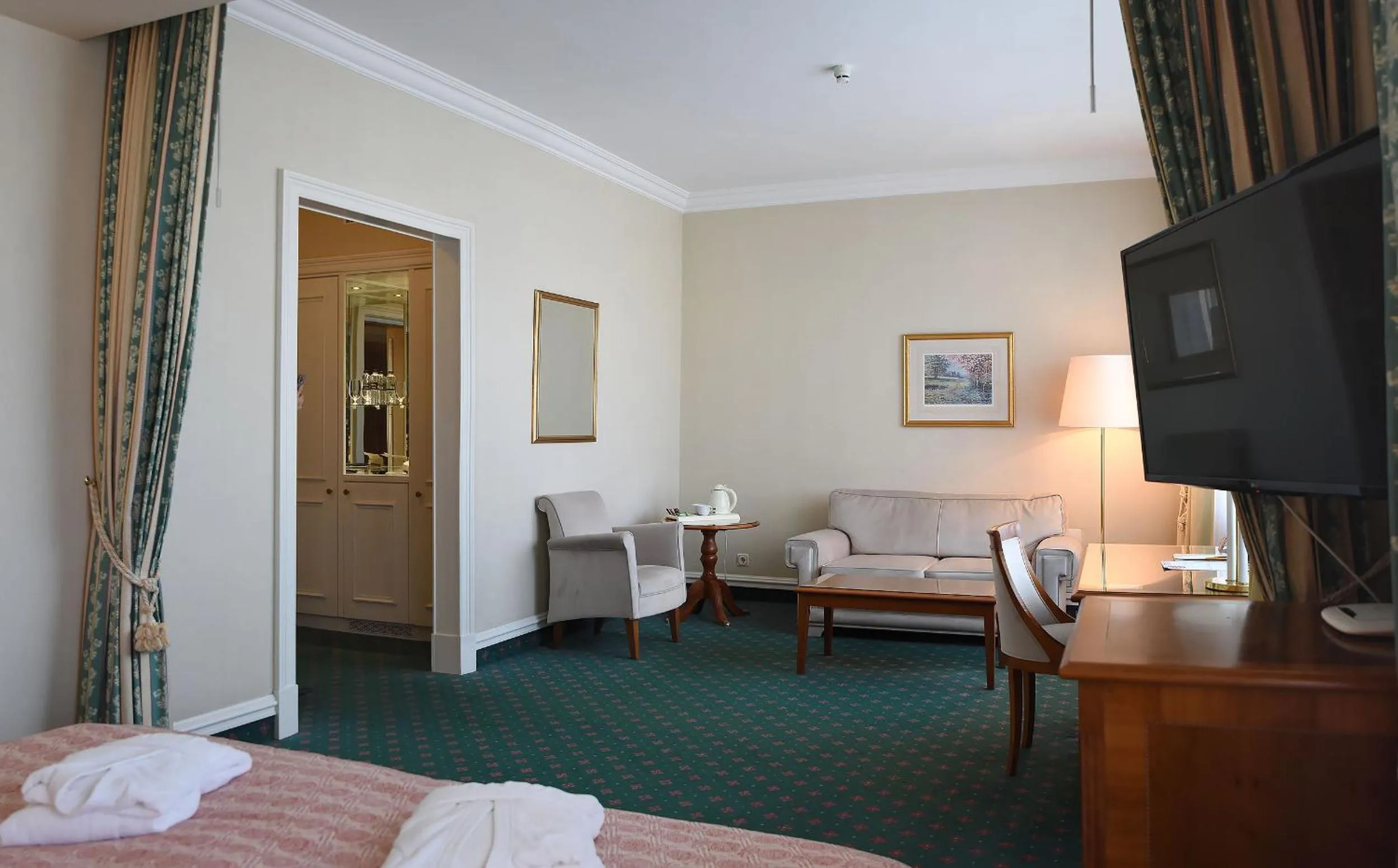 Seating area, Bed in Natsionalny Hotel