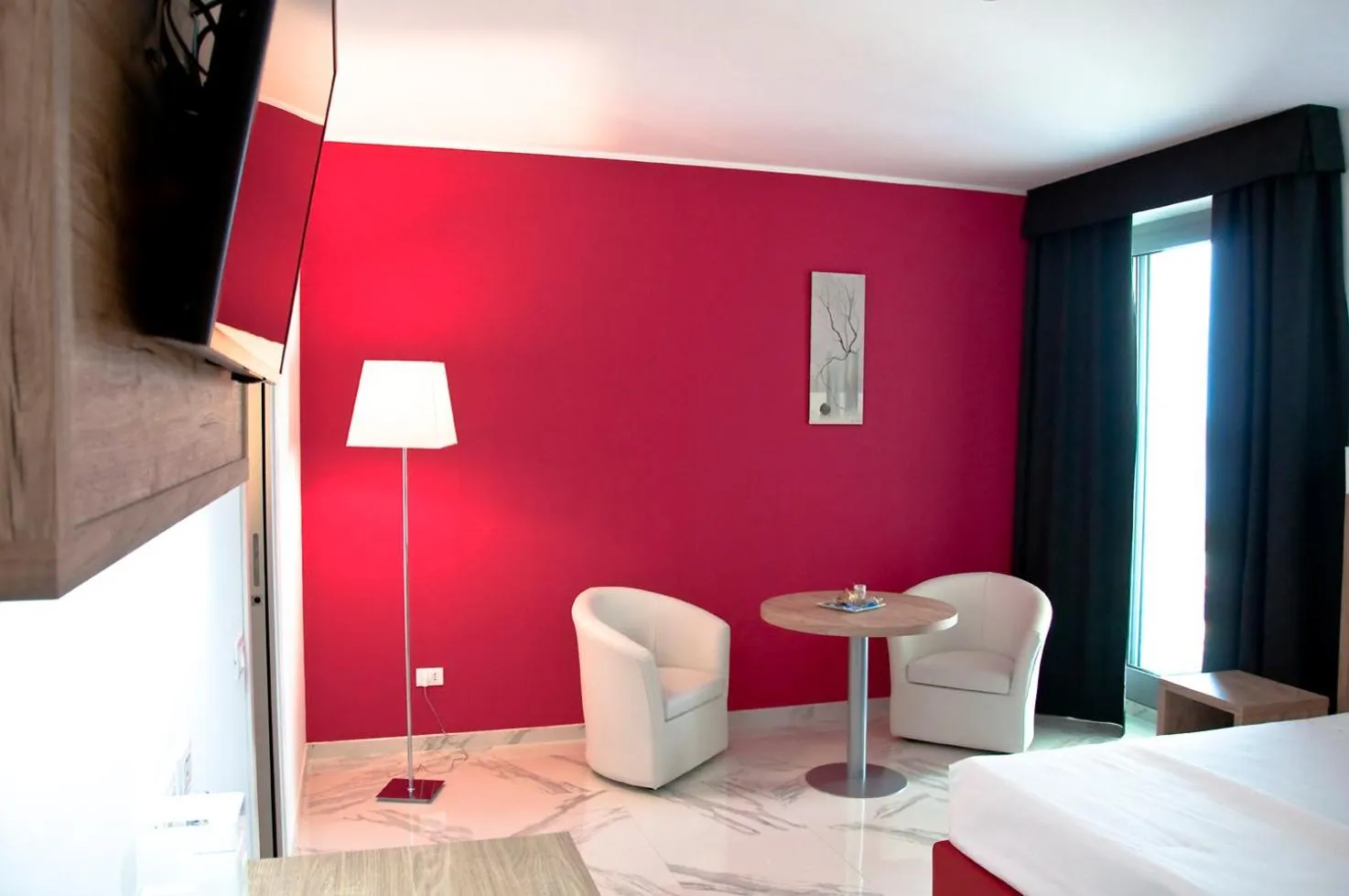 Photo of the whole room, Bed in Ambruosi Village Resort & SPA