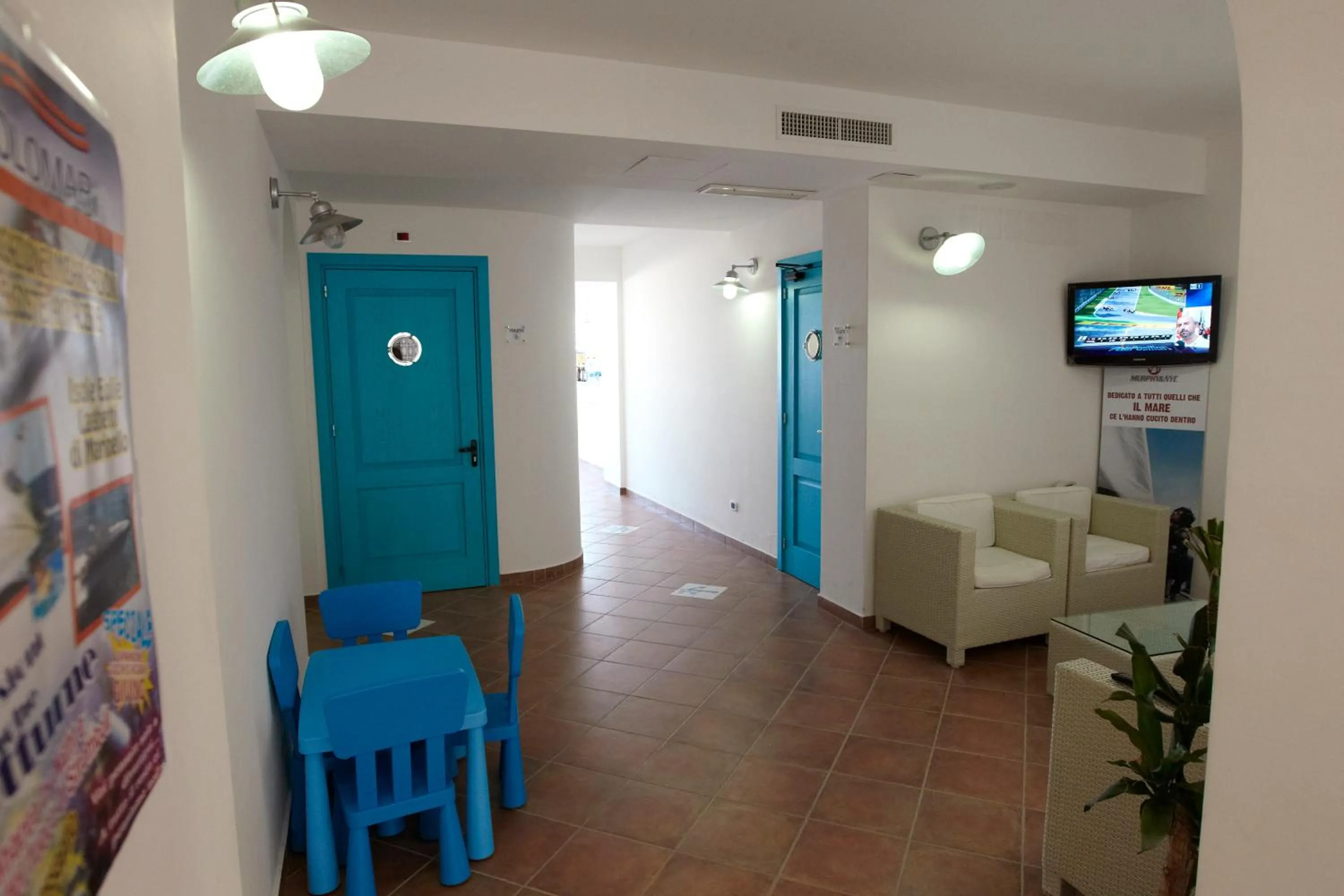 Communal lounge/ TV room in Yachting Club Mare