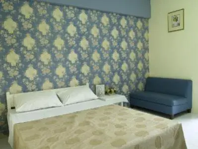 Bed in Chomdao Hotel Bed in Chomdao Hotel