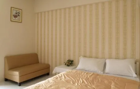 Bed in Chomdao Hotel