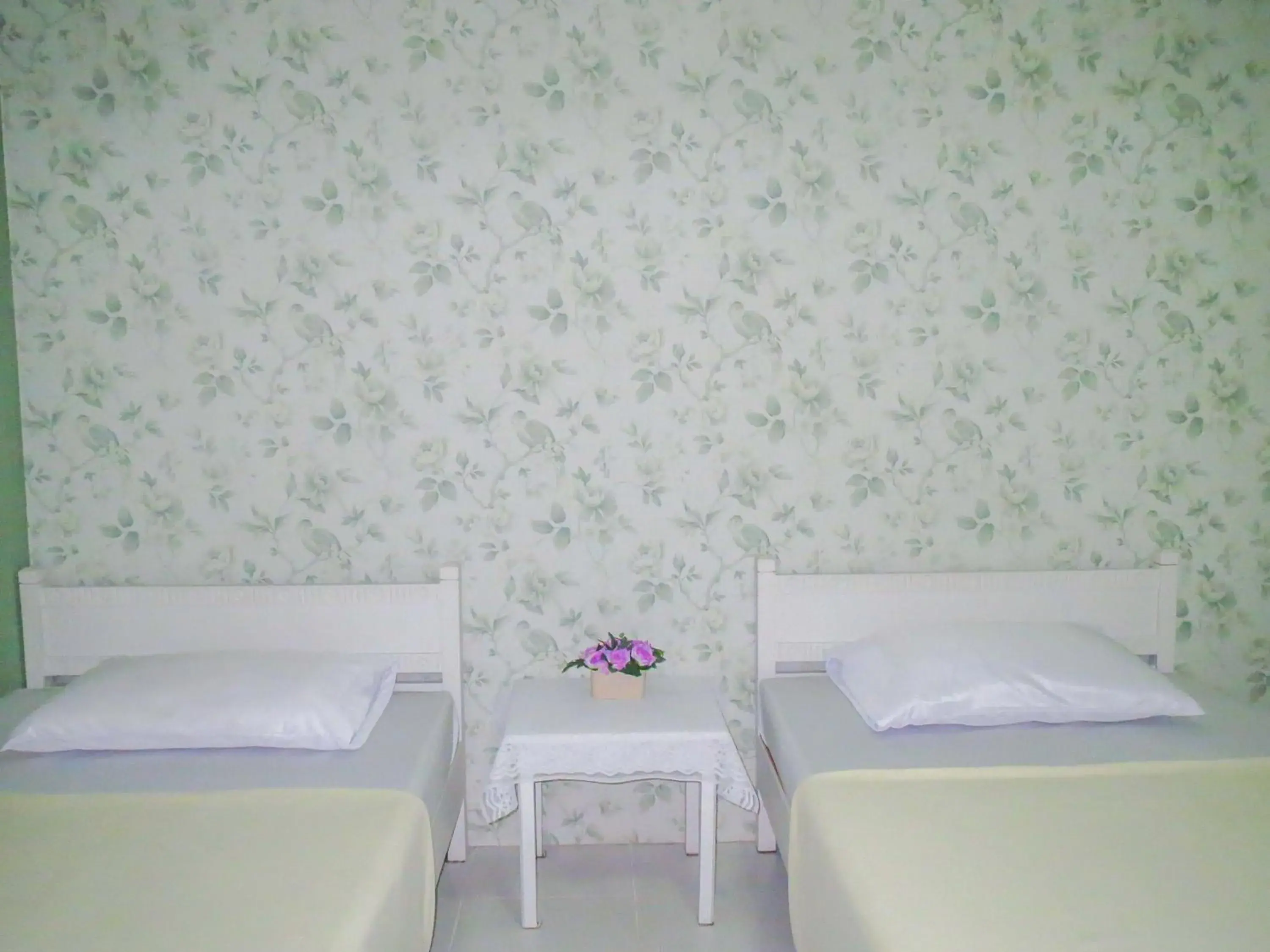 Bed in Chomdao Hotel Bed in Chomdao Hotel