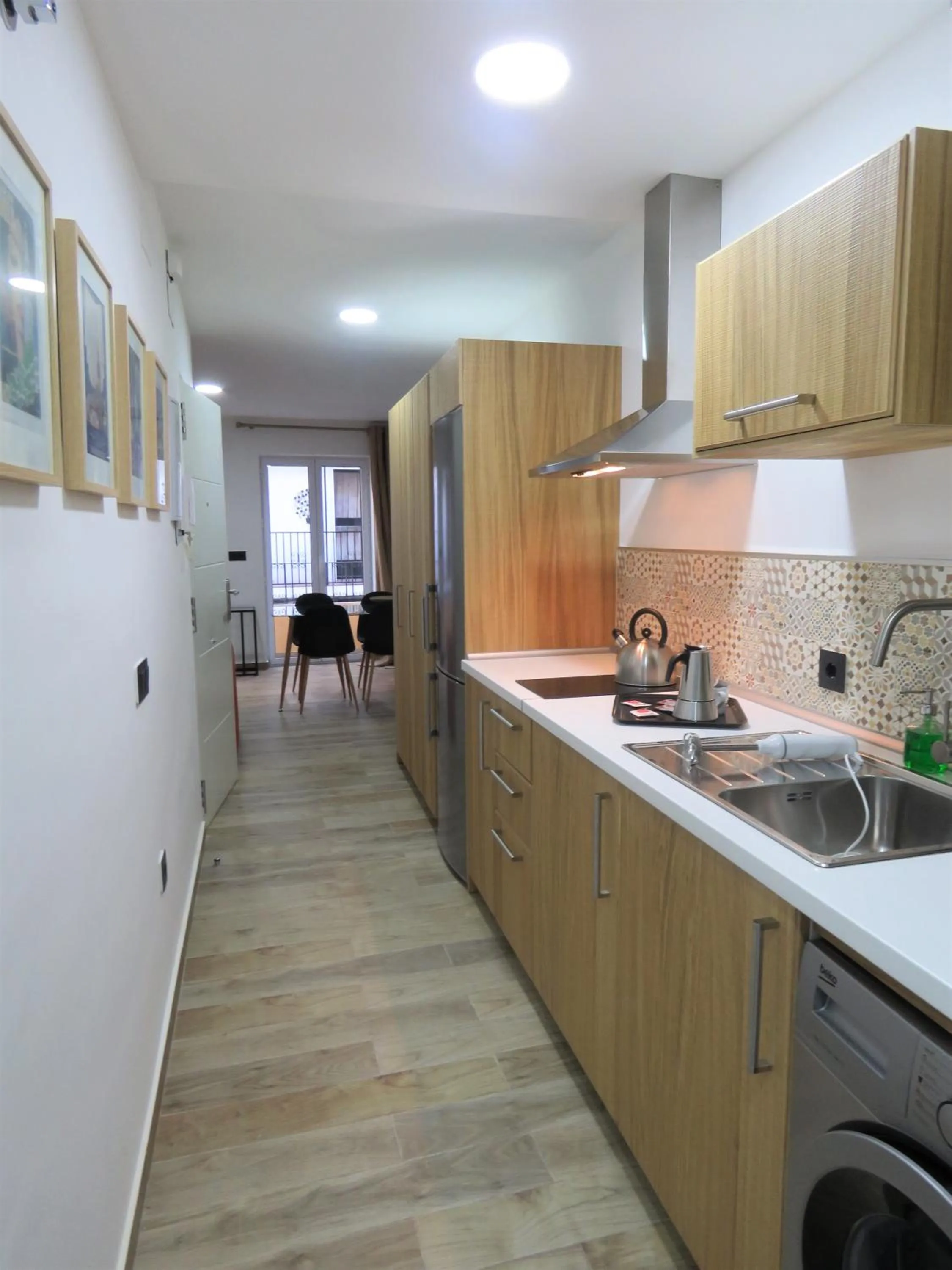 Kitchen or kitchenette in Living Sevilla Apartments Hércules