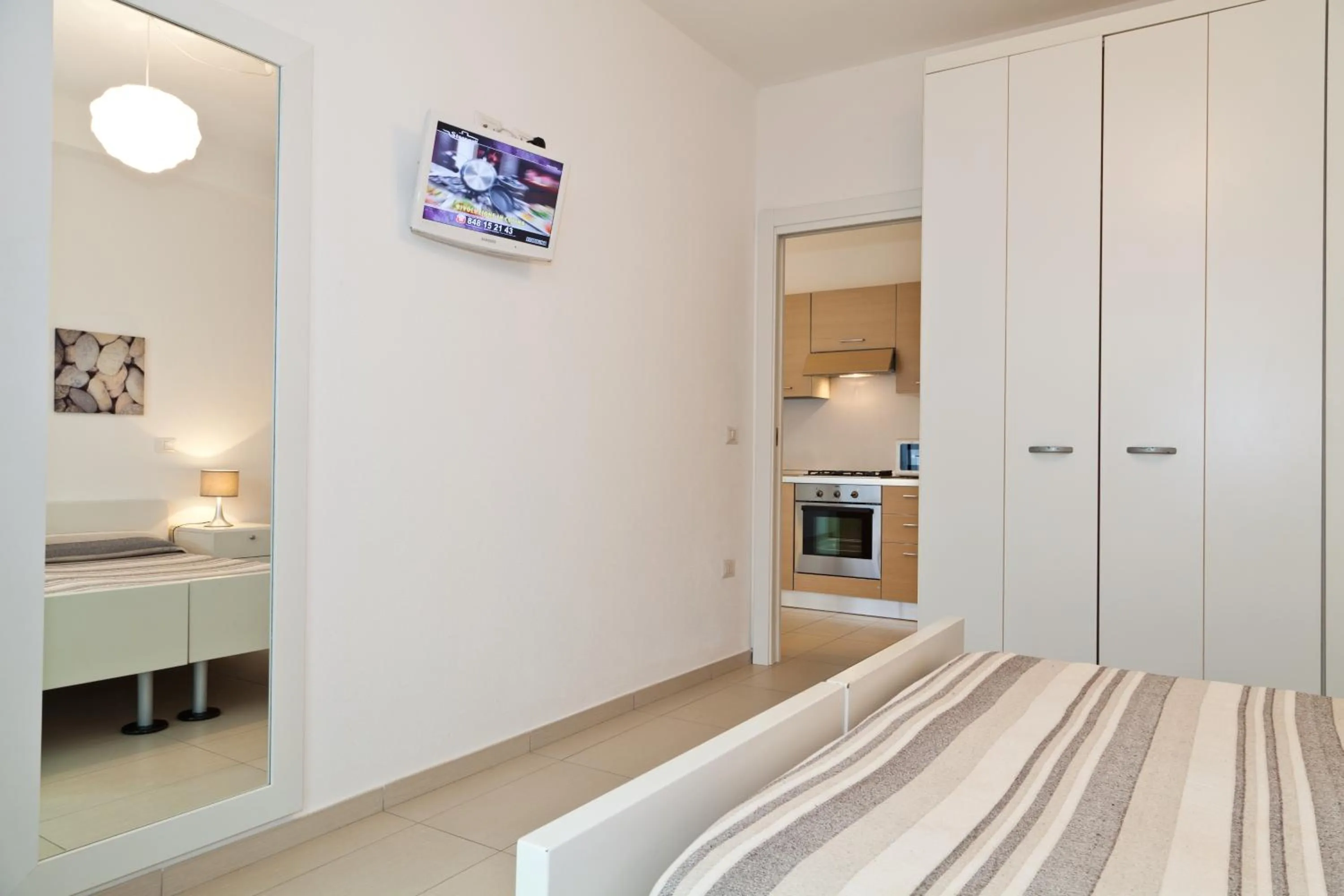 Kitchen or kitchenette, Bed in Abitare in Vacanza