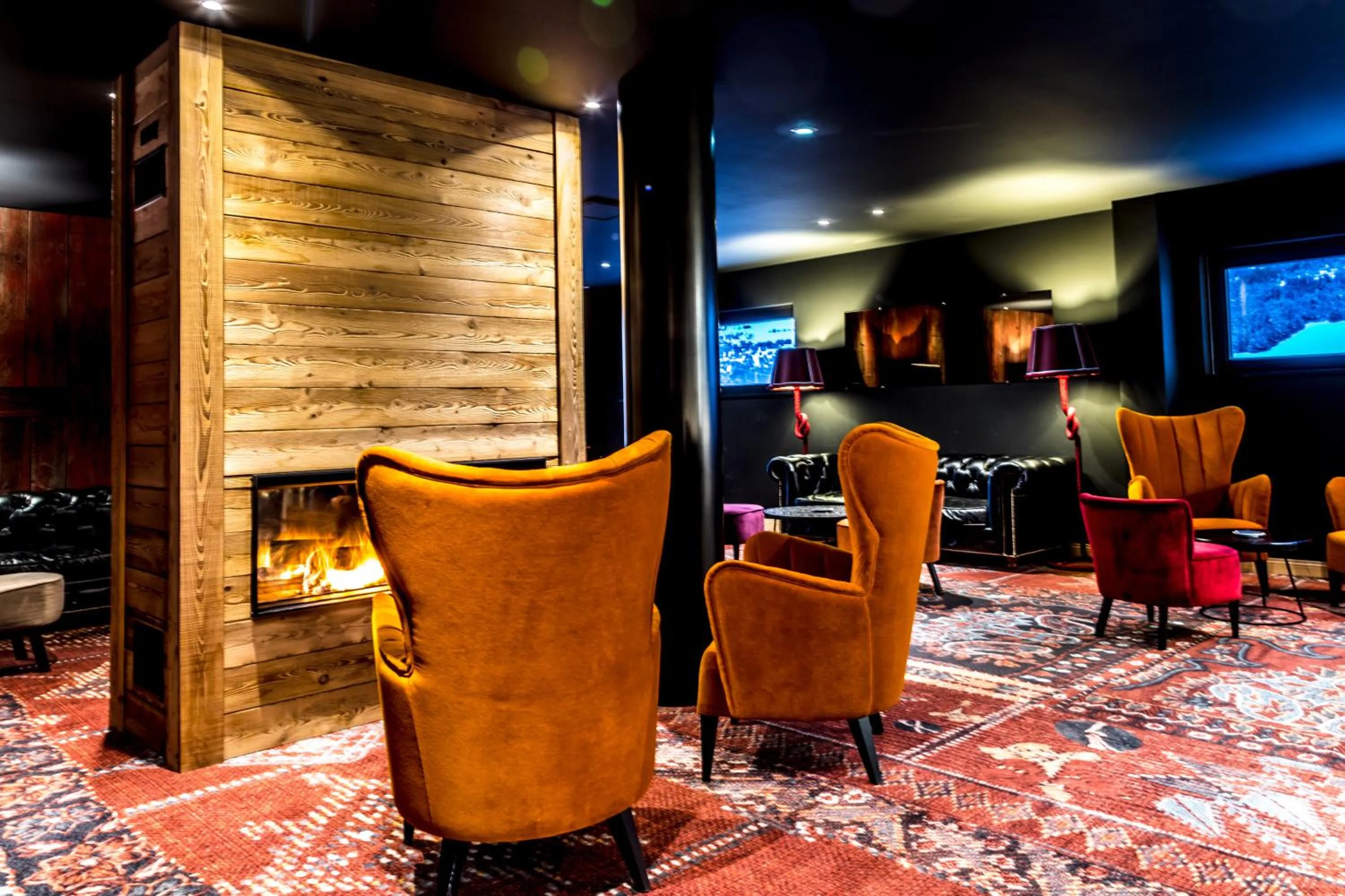 Communal lounge/ TV room in Hôtel Daria-I Nor by Les Etincelles