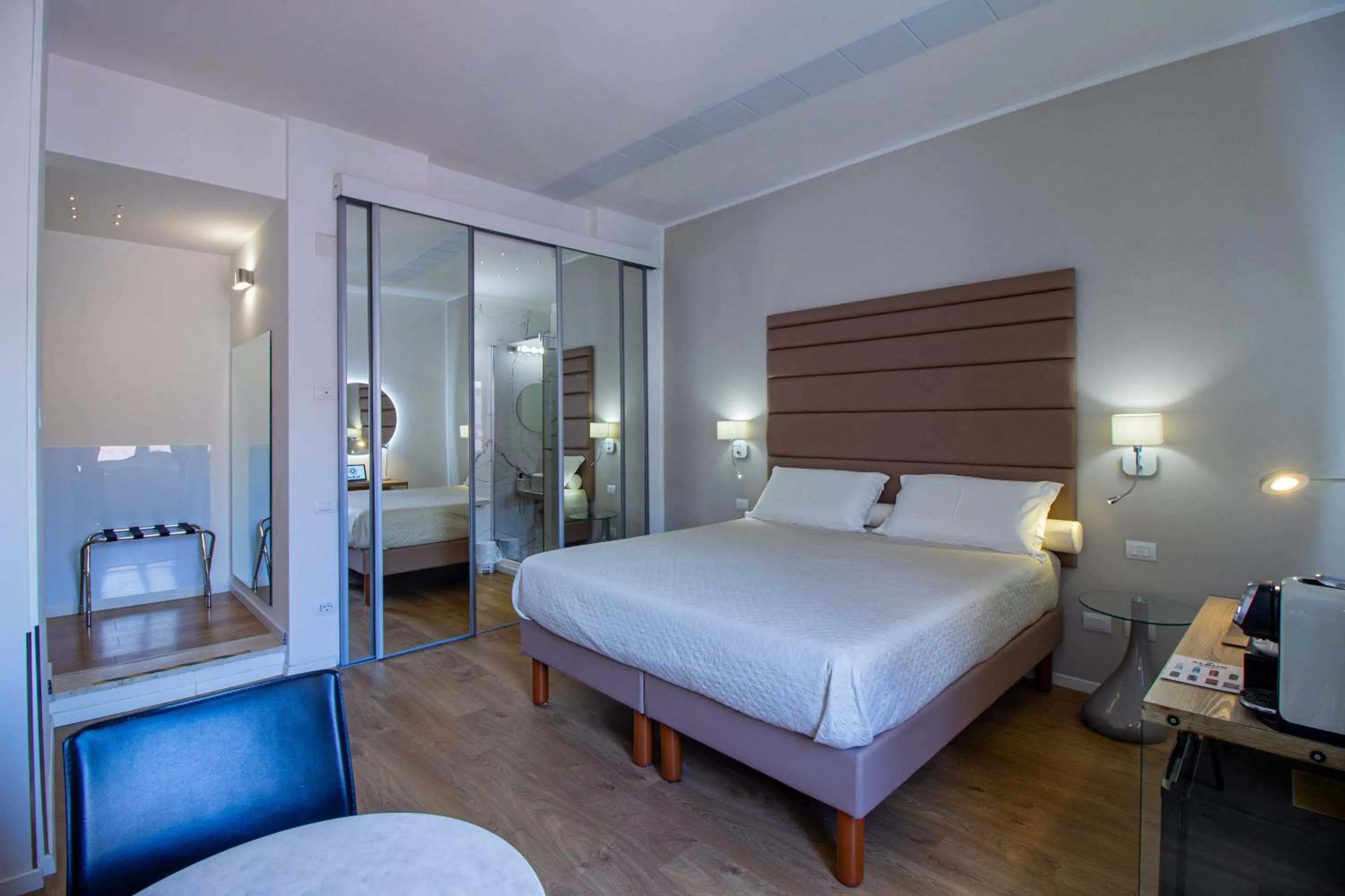 Bed in Album Boutique Rooms